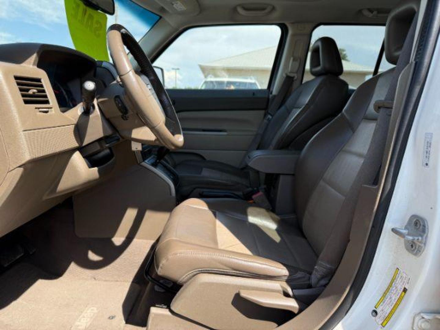 2007 Stone White Clearcoat /Pastel Slate Gray Jeep Patriot (1J8FF48W17D) with an 24L I-4 DOHC engine, Automatic transmission, located at 1175 N Woodruff Ave, Idaho Falls, ID, 83401, 43.506901, -111.999657 - At Timberline Auto, finding a great deal on your next vehicle is always easy! Our experienced sales staff's goal is to help find you the right vehicle at the right price! Our knowledgeable finance department has options for almost any credit score. We offer extended service contract options to prote - Photo#22