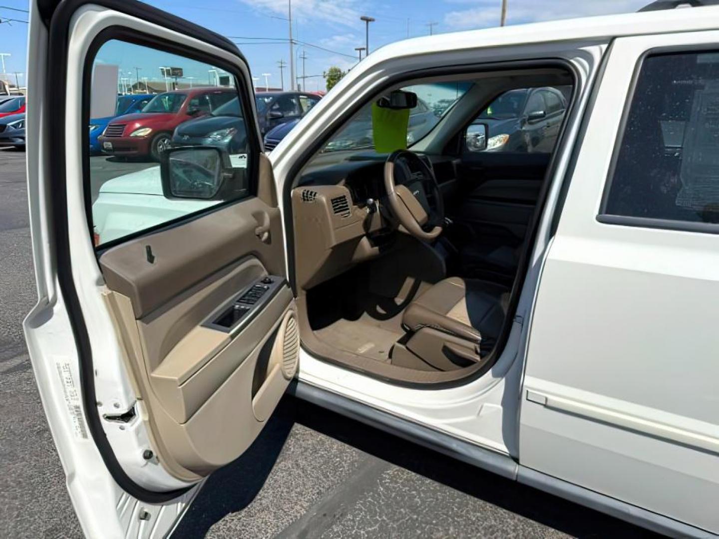 2007 Stone White Clearcoat /Pastel Slate Gray Jeep Patriot (1J8FF48W17D) with an 24L I-4 DOHC engine, Automatic transmission, located at 1175 N Woodruff Ave, Idaho Falls, ID, 83401, 43.506901, -111.999657 - At Timberline Auto, finding a great deal on your next vehicle is always easy! Our experienced sales staff's goal is to help find you the right vehicle at the right price! Our knowledgeable finance department has options for almost any credit score. We offer extended service contract options to prote - Photo#6