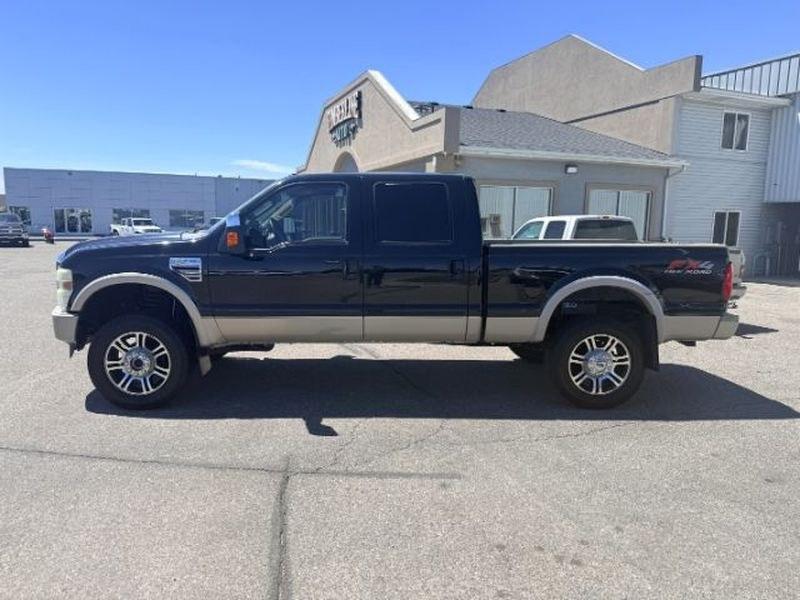 2010 Dark Blue Pearl /Chaparral Brown Ford F-250 King Ranch (1FTSW2BR2AE) with an V8, 6.4L engine, 5-speed automatic transmission, located at 1175 N Woodruff Ave, Idaho Falls, ID, 83401, 43.506901, -111.999657 - <b>Vehicle Details</b><br>Pre-owned 2010 Ford F-250 Super Duty King Ranch 4WD Diesel for sale in Idaho Falls, ID. This powerful heavy-duty pickup is built for serious towing, hauling, and everyday confidence on the road or jobsite. Under the hood, the V8 6.4L Diesel engine delivers the strength driv- Photo#1