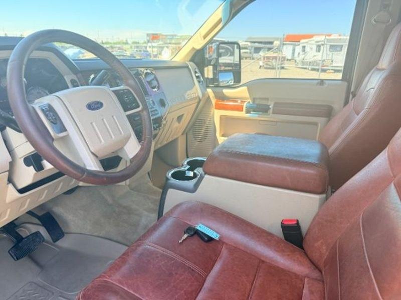 2010 Dark Blue Pearl /Chaparral Brown Ford F-250 King Ranch (1FTSW2BR2AE) with an V8, 6.4L engine, 5-speed automatic transmission, located at 1175 N Woodruff Ave, Idaho Falls, ID, 83401, 43.506901, -111.999657 - <b>Vehicle Details</b><br>Pre-owned 2010 Ford F-250 Super Duty King Ranch 4WD Diesel for sale in Idaho Falls, ID. This powerful heavy-duty pickup is built for serious towing, hauling, and everyday confidence on the road or jobsite. Under the hood, the V8 6.4L Diesel engine delivers the strength driv- Photo#12