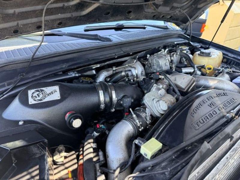 2010 Dark Blue Pearl /Chaparral Brown Ford F-250 King Ranch (1FTSW2BR2AE) with an V8, 6.4L engine, 5-speed automatic transmission, located at 1175 N Woodruff Ave, Idaho Falls, ID, 83401, 43.506901, -111.999657 - <b>Vehicle Details</b><br>Pre-owned 2010 Ford F-250 Super Duty King Ranch 4WD Diesel for sale in Idaho Falls, ID. This powerful heavy-duty pickup is built for serious towing, hauling, and everyday confidence on the road or jobsite. Under the hood, the V8 6.4L Diesel engine delivers the strength driv- Photo#23