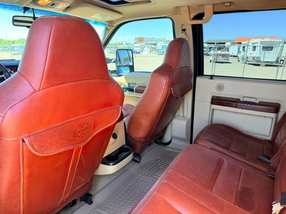 2010 BLACK /LEATHER Ford F-250 SD KING RANCH (1FTSW2BR2AE) with an 6.4L V8 engine, AUTOMATIC transmission, located at 1235 N Woodruff Ave., Idaho Falls, 83401, (208) 523-1053, 43.507172, -112.000488 - Premium ranch-inspired styling meets heavy-duty capability in this 2010 Ford F-250 Super Duty King Ranch, a full-size pickup designed for towing, hauling, and everyday truck use. Distinctive King Ranch details include rich maroon leather seating paired with signature wood trim accents that give the- Photo#22