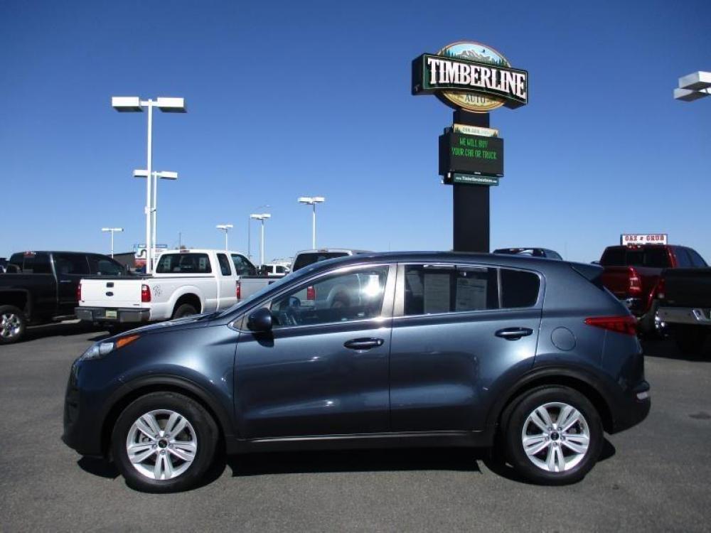 2018 BLUE /GREY KIA SPORTAGE LX (KNDPM3AC0J7) with an 4 engine, Automatic transmission, located at 1580 E Lincoln Rd, Idaho Falls, ID, 83401, (208) 523-4000, 0.000000, 0.000000 - 2.4L 4C- WAGON- 4WD- DRIVEN 39,987 MILES- CLOTH INTERIOR. At Timberline Auto it is always easy to find a great deal for a great vehicle. We pride ourselves on our ability to go the extra mile. With our exprerienced sales team we will be able to find you the right rig here on our lot or we can t - Photo #3