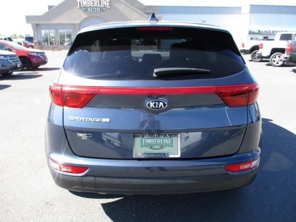 2018 BLUE /GREY KIA SPORTAGE LX (KNDPM3AC0J7) with an 4 engine, Automatic transmission, located at 1580 E Lincoln Rd, Idaho Falls, ID, 83401, (208) 523-4000, 0.000000, 0.000000 - 2.4L 4C- WAGON- 4WD- DRIVEN 39,987 MILES- CLOTH INTERIOR. At Timberline Auto it is always easy to find a great deal for a great vehicle. We pride ourselves on our ability to go the extra mile. With our exprerienced sales team we will be able to find you the right rig here on our lot or we can t - Photo #5