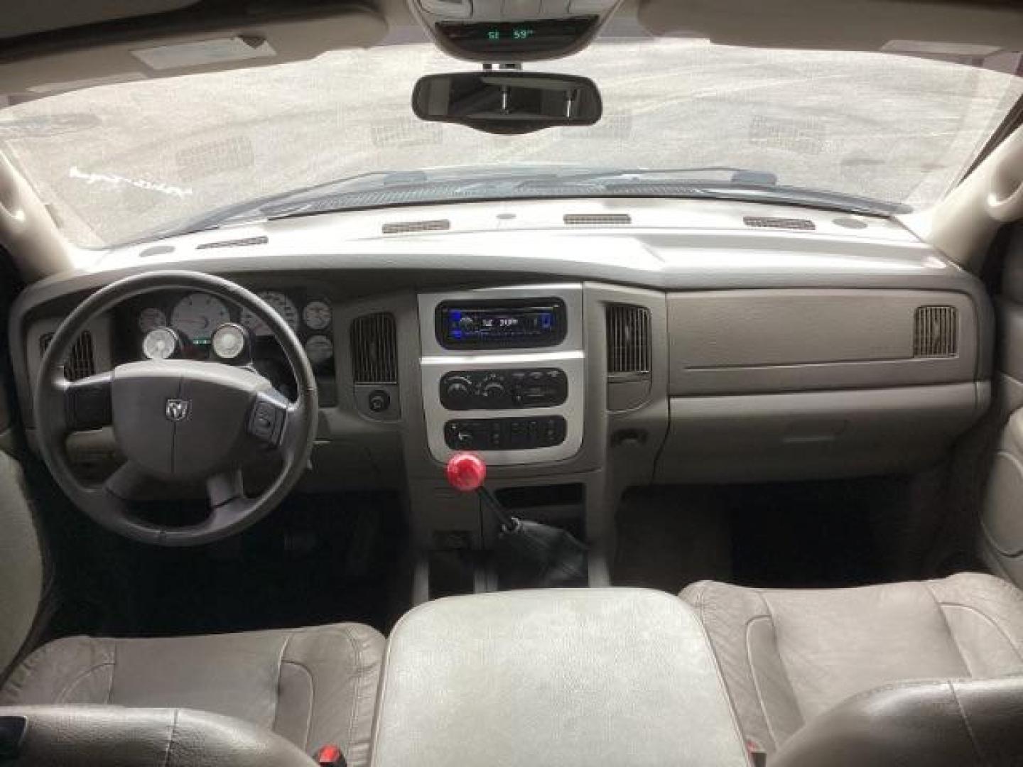 2004 Black /Dark Slate Gray Leather Interior Dodge Ram 2500 Laramie Quad Cab 4WD (3D7KU28C44G) with an 5.9L L6 OHV 24V TURBO DIESEL engine, 5-Speed Manual transmission, located at 1235 N Woodruff Ave., Idaho Falls, 83401, (208) 523-1053, 43.507172, -112.000488 - Photo#12