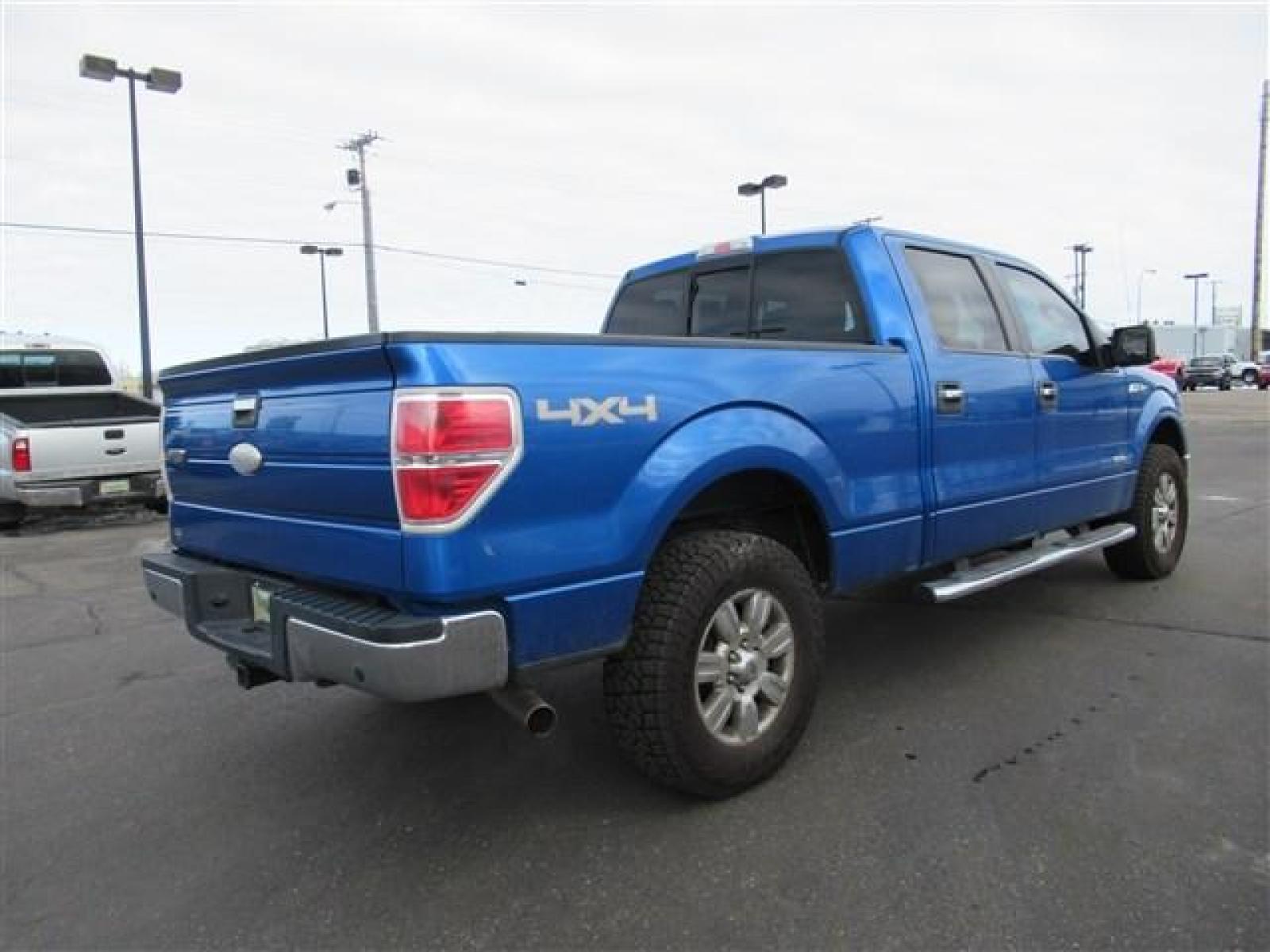 2011 BLUE /TAN FORD F150 XLT (1FTFW1ET9BF) with an 6 engine, Automatic transmission, located at 1580 E Lincoln Rd, Idaho Falls, ID, 83401, (208) 523-4000, 0.000000, 0.000000 - 3.5L ECOBOOST- 4WD- CLOTH INTERIOR. CREW CAB- DRIVEN MILES-171,672 At Timberline Auto it is always easy to find a great deal for a great vehicle. We pride ourselves on our ability to go the extra mile. With our exprerienced sales team we will be able to find you the right rig here on our lot o - Photo #4