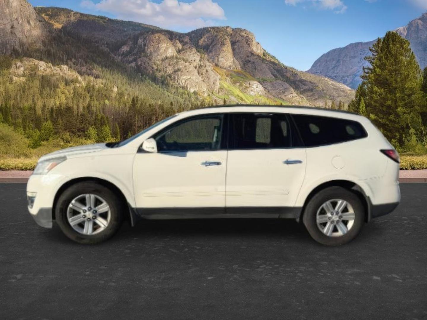 2013 WHITE /Ebony Chevrolet Traverse 1LT AWD (1GNKVGKD1DJ) with an 3.6L V6 DOHC 24V engine, 6-Speed Automatic transmission, located at 1235 N Woodruff Ave., Idaho Falls, 83401, (208) 523-1053, 43.507172, -112.000488 - At Timberline Auto, finding a great deal on your next vehicle is always easy! Our experienced sales staff goal is to help find you the right vehicle at the right price! Our knowledgeable finance department has options for almost any credit score. We offer extended service contract options to prot - Photo#1