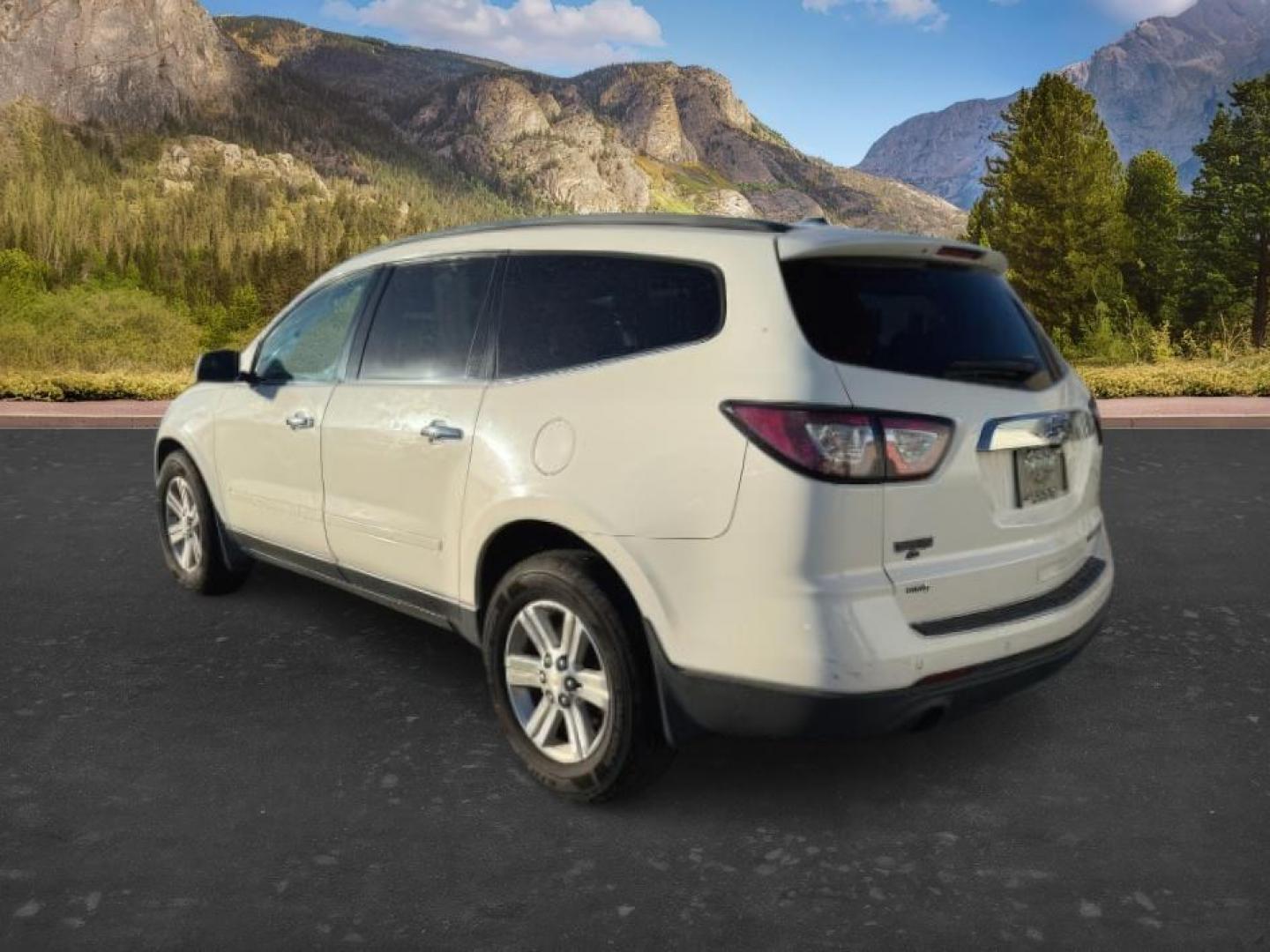 2013 WHITE /Ebony Chevrolet Traverse 1LT AWD (1GNKVGKD1DJ) with an 3.6L V6 DOHC 24V engine, 6-Speed Automatic transmission, located at 1235 N Woodruff Ave., Idaho Falls, 83401, (208) 523-1053, 43.507172, -112.000488 - At Timberline Auto, finding a great deal on your next vehicle is always easy! Our experienced sales staff goal is to help find you the right vehicle at the right price! Our knowledgeable finance department has options for almost any credit score. We offer extended service contract options to prot - Photo#2