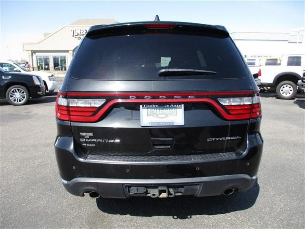 2014 BLACK /BLACK DODGE DURANGO CITADEL (1C4RDJEG0EC) with an 6 engine, Automatic transmission, located at 1580 E Lincoln Rd, Idaho Falls, ID, 83401, (208) 523-4000, 0.000000, 0.000000 - 3.6L V6- AWD- 3RD ROW SEATING- DRIVEN 131,039 MILES- LEATHER INTERIOR. At Timberline Auto it is always easy to find a great deal for a great vehicle. We pride ourselves on our ability to go the extra mile. With our exprerienced sales team we will be able to find you the right rig here on our lo - Photo #5