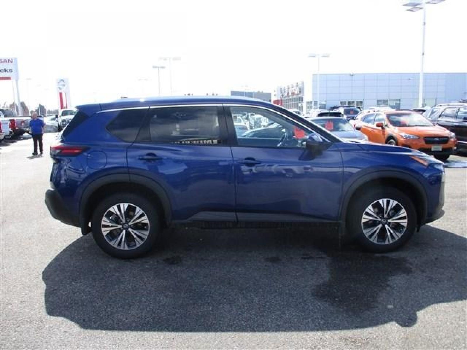 2021 BLUE /GREY NISSAN ROGUE SV (5N1AT3BA7MC) with an 4 engine, Automatic transmission, located at 1580 E Lincoln Rd, Idaho Falls, ID, 83401, (208) 523-4000, 0.000000, 0.000000 - Smells new, drives new, and looks new. Everything is in perfect condition. Premium cloth seats. Large infotainment screen. Steering wheel mounted controls. Collision avoidence. Adaptive cruise control. Steering assist. Blind spot monitor. Front facing camera. 360 degree back up camera. Parking sens - Photo #6