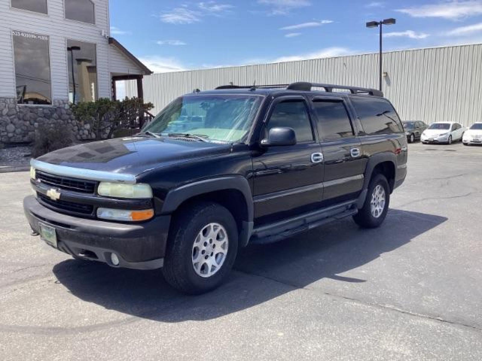 2004 Black /Gray/Dark Charcoal Leather Interior Chevrolet Suburban 1500 4WD (3GNFK16Z64G) with an 5.3L V8 OHV 16V FFV engine, 4-Speed Automatic transmission, located at 1235 N Woodruff Ave., Idaho Falls, 83401, (208) 523-1053, 43.507172, -112.000488 - Photo #0
