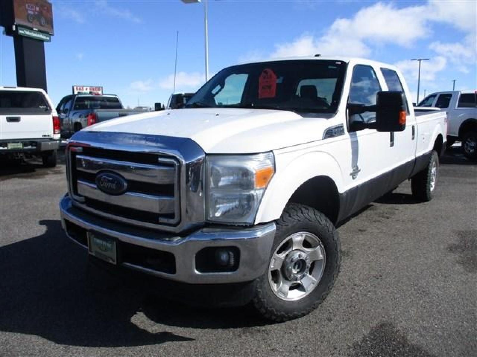 2015 WHITE /GREY FORD F350 XLT (1FT8W3BT9FE) with an 8 engine, Automatic transmission, located at 1580 E Lincoln Rd, Idaho Falls, ID, 83401, (208) 523-4000, 0.000000, 0.000000 - FX4 PACKAGE. RHINO LINED ROCKERS. NEVER HAD A FIFTH WHEEL INSTALLED. NEWER TIRES WITH 80% TREAD LEFT. 8 FOOT BED. TOW MIRRORS. VYNIL FLOORING. 4 WHEEL DRIVE WITH LOCKING REAR DIFF. TRAILER BRAKE. EXHAUST BRAKE. AUXILIARY SWITCHES. CRUSISE CONTROL. POWER WINDOWS/LOCKS. 6.7L POWERSTROKE- 4WD- CREW - Photo #1