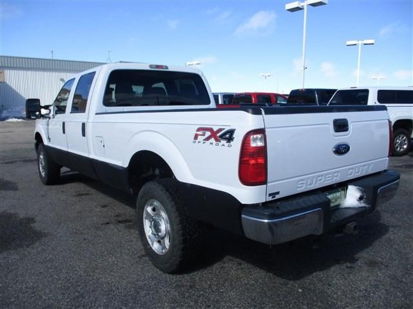 2015 WHITE /GREY FORD F350 XLT (1FT8W3BT9FE) with an 8 engine, Automatic transmission, located at 1580 E Lincoln Rd, Idaho Falls, ID, 83401, (208) 523-4000, 0.000000, 0.000000 - FX4 PACKAGE. RHINO LINED ROCKERS. NEVER HAD A FIFTH WHEEL INSTALLED. NEWER TIRES WITH 80% TREAD LEFT. 8 FOOT BED. TOW MIRRORS. VYNIL FLOORING. 4 WHEEL DRIVE WITH LOCKING REAR DIFF. TRAILER BRAKE. EXHAUST BRAKE. AUXILIARY SWITCHES. CRUSISE CONTROL. POWER WINDOWS/LOCKS. 6.7L POWERSTROKE- 4WD- CREW - Photo #3