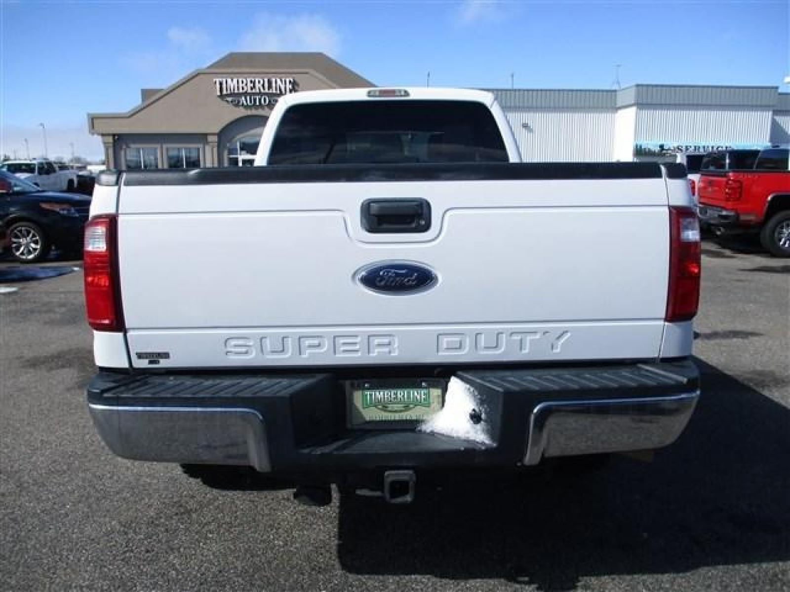 2015 WHITE /GREY FORD F350 XLT (1FT8W3BT9FE) with an 8 engine, Automatic transmission, located at 1580 E Lincoln Rd, Idaho Falls, ID, 83401, (208) 523-4000, 0.000000, 0.000000 - FX4 PACKAGE. RHINO LINED ROCKERS. NEVER HAD A FIFTH WHEEL INSTALLED. NEWER TIRES WITH 80% TREAD LEFT. 8 FOOT BED. TOW MIRRORS. VYNIL FLOORING. 4 WHEEL DRIVE WITH LOCKING REAR DIFF. TRAILER BRAKE. EXHAUST BRAKE. AUXILIARY SWITCHES. CRUSISE CONTROL. POWER WINDOWS/LOCKS. 6.7L POWERSTROKE- 4WD- CREW - Photo #4