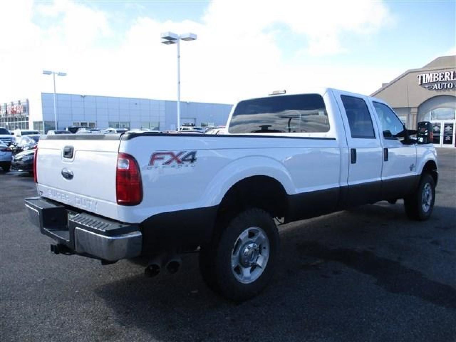 2015 WHITE /GREY FORD F350 XLT (1FT8W3BT9FE) with an 8 engine, Automatic transmission, located at 1580 E Lincoln Rd, Idaho Falls, ID, 83401, (208) 523-4000, 0.000000, 0.000000 - FX4 PACKAGE. RHINO LINED ROCKERS. NEVER HAD A FIFTH WHEEL INSTALLED. NEWER TIRES WITH 80% TREAD LEFT. 8 FOOT BED. TOW MIRRORS. VYNIL FLOORING. 4 WHEEL DRIVE WITH LOCKING REAR DIFF. TRAILER BRAKE. EXHAUST BRAKE. AUXILIARY SWITCHES. CRUSISE CONTROL. POWER WINDOWS/LOCKS. 6.7L POWERSTROKE- 4WD- CREW - Photo #5