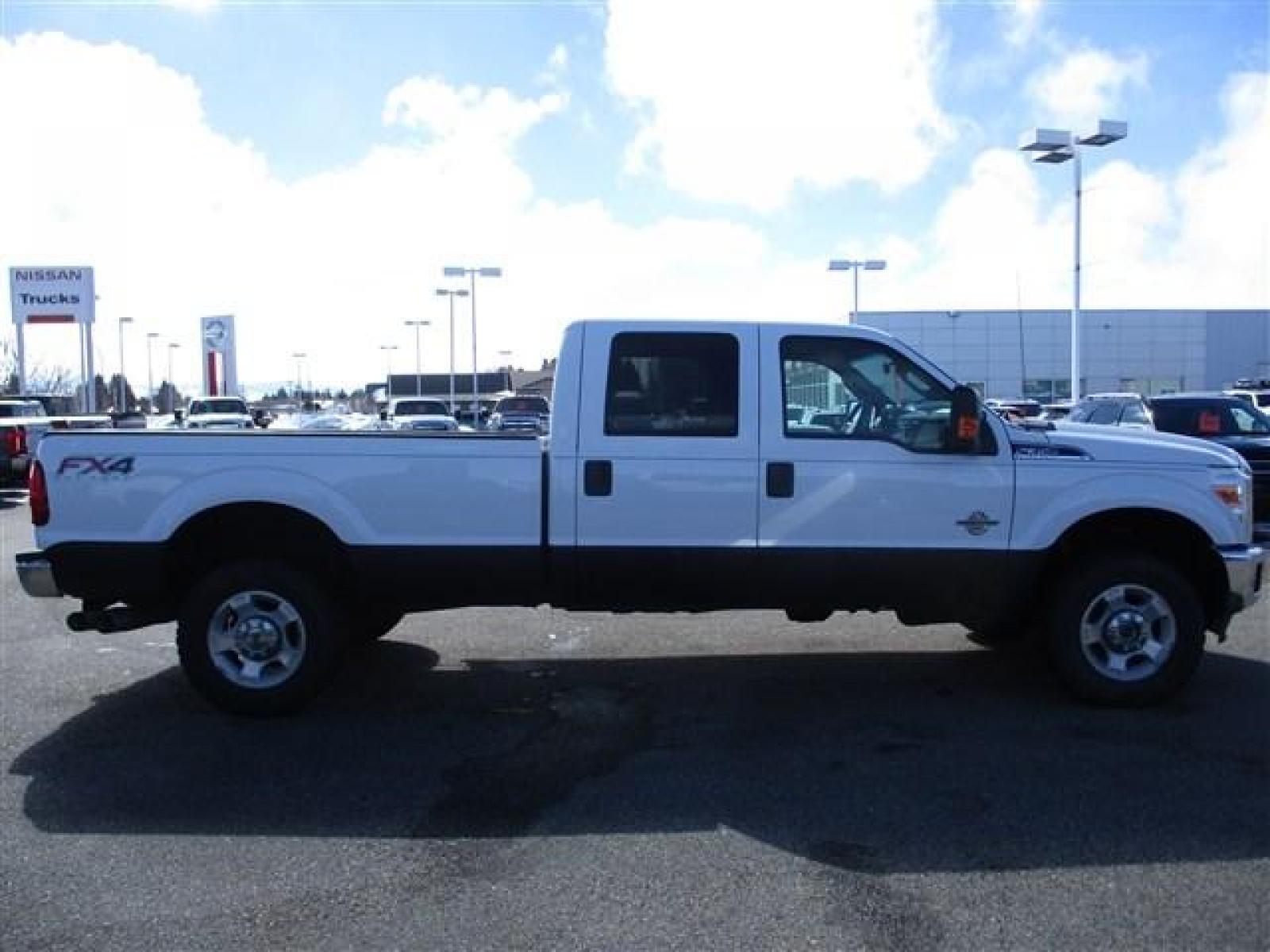 2015 WHITE /GREY FORD F350 XLT (1FT8W3BT9FE) with an 8 engine, Automatic transmission, located at 1580 E Lincoln Rd, Idaho Falls, ID, 83401, (208) 523-4000, 0.000000, 0.000000 - FX4 PACKAGE. RHINO LINED ROCKERS. NEVER HAD A FIFTH WHEEL INSTALLED. NEWER TIRES WITH 80% TREAD LEFT. 8 FOOT BED. TOW MIRRORS. VYNIL FLOORING. 4 WHEEL DRIVE WITH LOCKING REAR DIFF. TRAILER BRAKE. EXHAUST BRAKE. AUXILIARY SWITCHES. CRUSISE CONTROL. POWER WINDOWS/LOCKS. 6.7L POWERSTROKE- 4WD- CREW - Photo #6