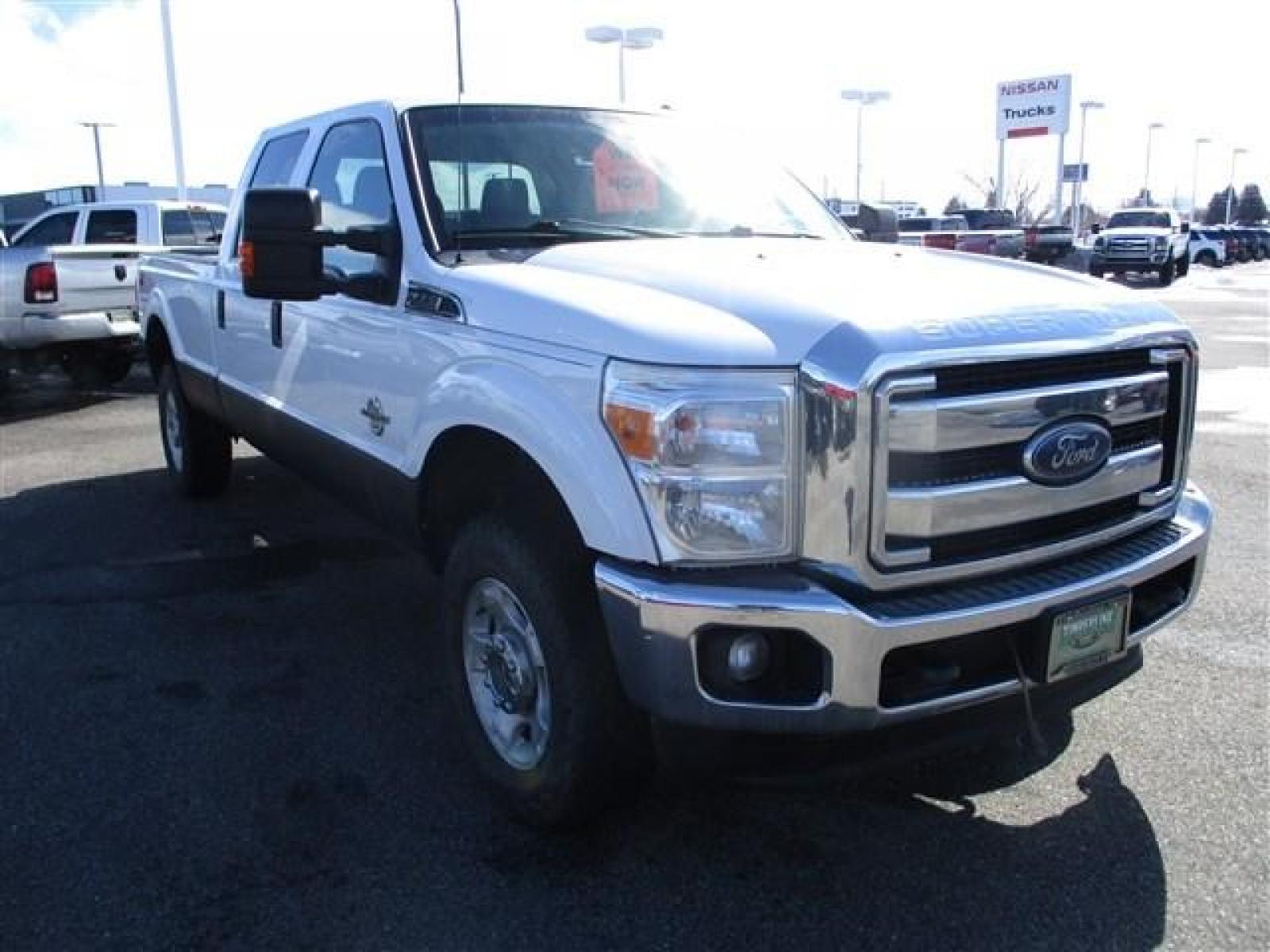 2015 WHITE /GREY FORD F350 XLT (1FT8W3BT9FE) with an 8 engine, Automatic transmission, located at 1580 E Lincoln Rd, Idaho Falls, ID, 83401, (208) 523-4000, 0.000000, 0.000000 - FX4 PACKAGE. RHINO LINED ROCKERS. NEVER HAD A FIFTH WHEEL INSTALLED. NEWER TIRES WITH 80% TREAD LEFT. 8 FOOT BED. TOW MIRRORS. VYNIL FLOORING. 4 WHEEL DRIVE WITH LOCKING REAR DIFF. TRAILER BRAKE. EXHAUST BRAKE. AUXILIARY SWITCHES. CRUSISE CONTROL. POWER WINDOWS/LOCKS. 6.7L POWERSTROKE- 4WD- CREW - Photo #7