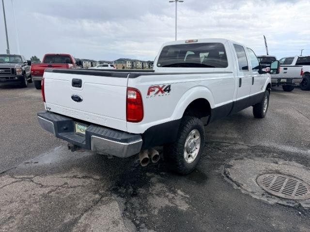 2015 WHITE /Steel Ford F-350 SD XL Crew Cab Long Bed 4WD (1FT8W3BT9FE) with an 6.7L V8 OHV 16V DIESEL engine, 6-Speed Automatic transmission, located at 1235 N Woodruff Ave., Idaho Falls, 83401, (208) 523-1053, 43.507172, -112.000488 - Serious towing and heavy duty truck performance come together in this 2015 Ford F-350 Super Duty Crew Cab 4x4 equipped with a 6.7L Power Stroke turbo diesel engine. Diesel torque and Super Duty engineering provide the strength truck buyers look for when handling trailers, equipment, and larger hauli- Photo#31