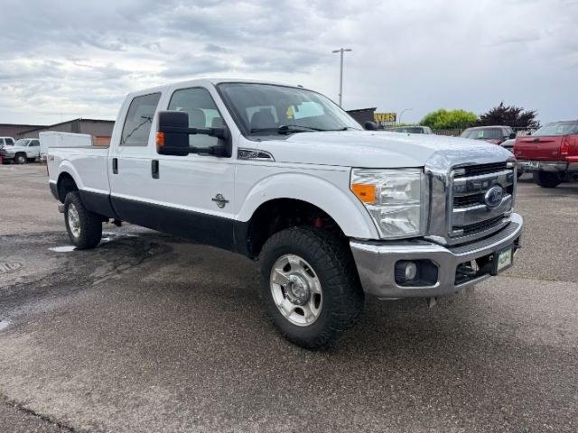 2015 WHITE /Steel Ford F-350 SD XL Crew Cab Long Bed 4WD (1FT8W3BT9FE) with an 6.7L V8 OHV 16V DIESEL engine, 6-Speed Automatic transmission, located at 1235 N Woodruff Ave., Idaho Falls, 83401, (208) 523-1053, 43.507172, -112.000488 - Serious towing and heavy duty truck performance come together in this 2015 Ford F-350 Super Duty Crew Cab 4x4 equipped with a 6.7L Power Stroke turbo diesel engine. Diesel torque and Super Duty engineering provide the strength truck buyers look for when handling trailers, equipment, and larger hauli- Photo#33
