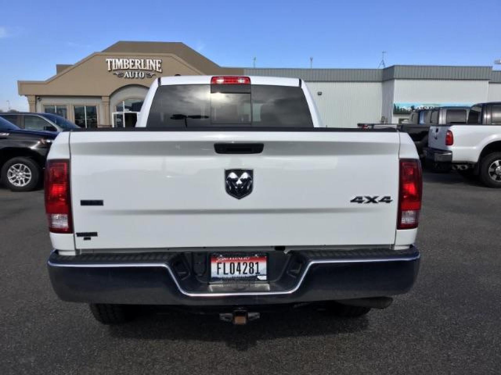 2019 Bright White Clear Coat /Black/Diesel Gray, cloth RAM 1500 Classic Tradesman Crew Cab LWB 4WD (1C6RR7TT0KS) with an 5.7L V8 OHV 16V engine, 8-Speed Automatic transmission, located at 1235 N Woodruff Ave., Idaho Falls, 83401, (208) 523-1053, 43.507172, -112.000488 - Here's a vehicle that has all of the modern mechanical features without all the fancy bells and whistles on the inside. The Classic trim package offers manual adjustable seating, a smaller info-tainment screen, but still has power windows and locks. The 5.7L V8 HEMI engine offers up to 7,500 max tow - Photo #4
