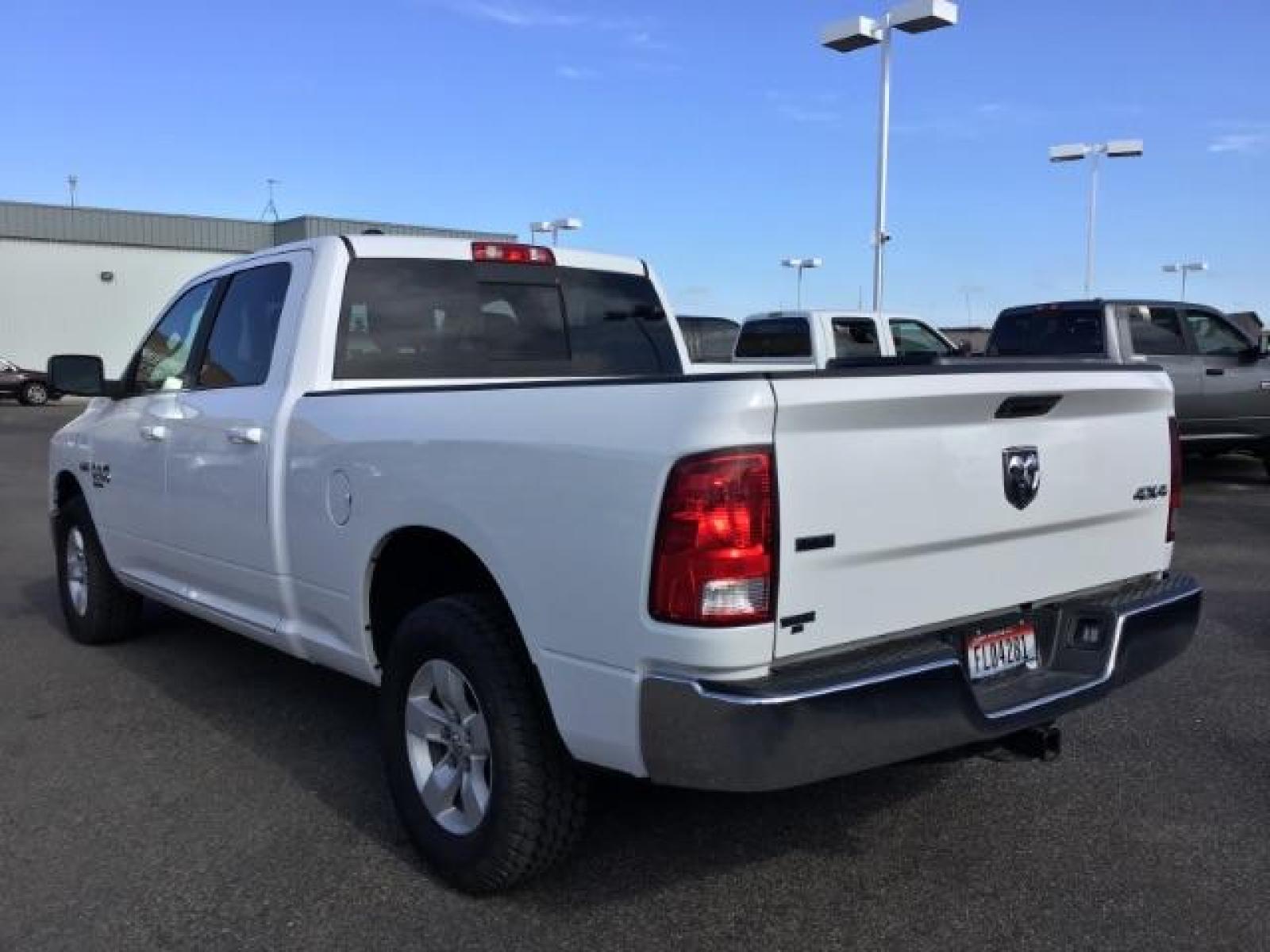 2019 Bright White Clear Coat /Black/Diesel Gray, cloth RAM 1500 Classic Tradesman Crew Cab LWB 4WD (1C6RR7TT0KS) with an 5.7L V8 OHV 16V engine, 8-Speed Automatic transmission, located at 1235 N Woodruff Ave., Idaho Falls, 83401, (208) 523-1053, 43.507172, -112.000488 - Here's a vehicle that has all of the modern mechanical features without all the fancy bells and whistles on the inside. The Classic trim package offers manual adjustable seating, a smaller info-tainment screen, but still has power windows and locks. The 5.7L V8 HEMI engine offers up to 7,500 max tow - Photo #3