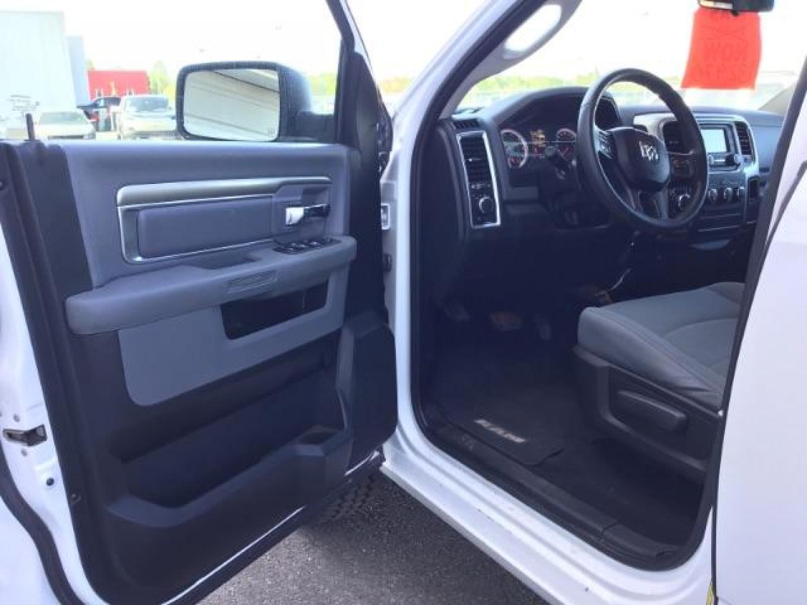 2019 Bright White Clear Coat /Black/Diesel Gray, cloth RAM 1500 Classic Tradesman Crew Cab LWB 4WD (1C6RR7TT0KS) with an 5.7L V8 OHV 16V engine, 8-Speed Automatic transmission, located at 1235 N Woodruff Ave., Idaho Falls, 83401, (208) 523-1053, 43.507172, -112.000488 - Here's a vehicle that has all of the modern mechanical features without all the fancy bells and whistles on the inside. The Classic trim package offers manual adjustable seating, a smaller info-tainment screen, but still has power windows and locks. The 5.7L V8 HEMI engine offers up to 7,500 max tow - Photo #9