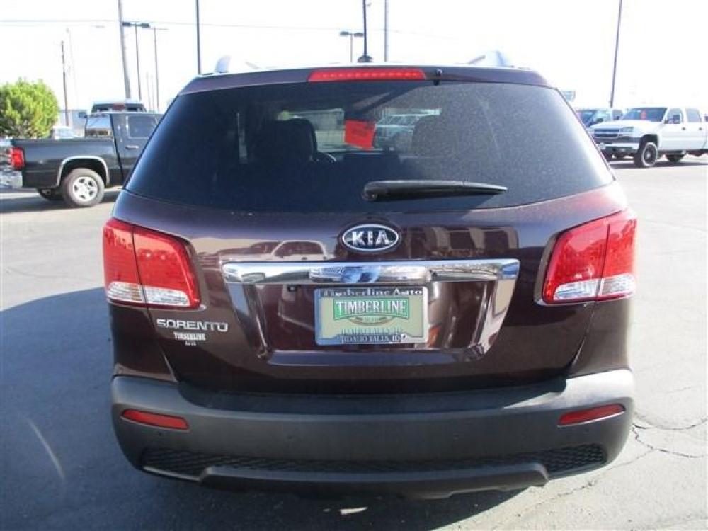 2013 PURPLE KIA SORENTO LX (5XYKT4A61DG) with an 4 engine, 6 Speed Automatic transmission, located at 1580 E Lincoln Rd, Idaho Falls, ID, 83401, (208) 523-4000, 0.000000, 0.000000 - Photo #3