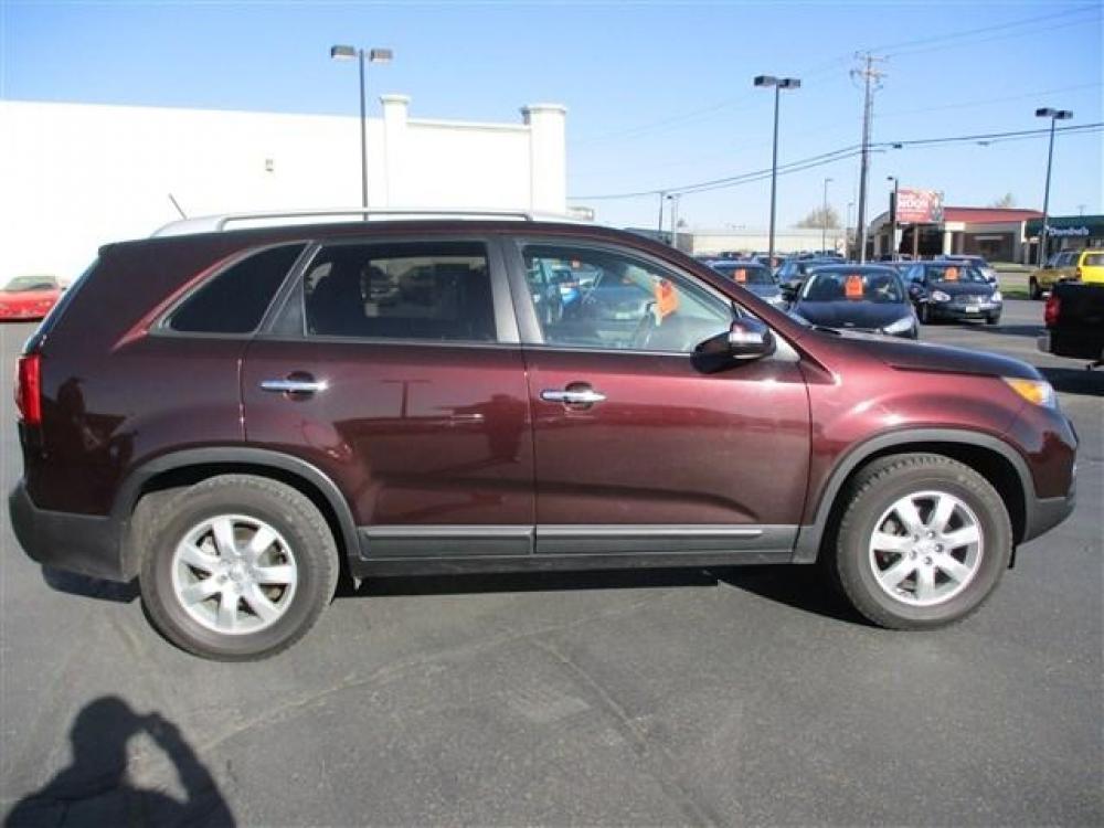 2013 PURPLE KIA SORENTO LX (5XYKT4A61DG) with an 4 engine, 6 Speed Automatic transmission, located at 1580 E Lincoln Rd, Idaho Falls, ID, 83401, (208) 523-4000, 0.000000, 0.000000 - Photo #5