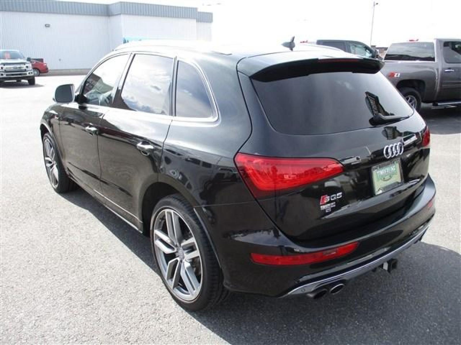 2015 BLACK /BLACK AUDI SQ5 PRESTIGE (WA1VGAFP9FA) with an 6 engine, Automatic transmission, located at 1580 E Lincoln Rd, Idaho Falls, ID, 83401, (208) 523-4000, 0.000000, 0.000000 - 4.7 SECOND 0-60 TIME. 354 HORSEPOWER. 8 SPEED AUTOMATIC TRANSMISSION. FACTORY 20 INCH AUDI SPORT RIMS WRAPPED IN PIRELLI TIRES. BODY AND PAINT ARE IN AMAZING CONDITION. THE PAINT IS A TRI-COAT BLACK WITH FLAKES OF BLUE, PURPLE, AND GREEN (MUST SEE IN PERSON). INSIDE THE CAR YOU'LL FIND SUADE CENTERS - Photo #4