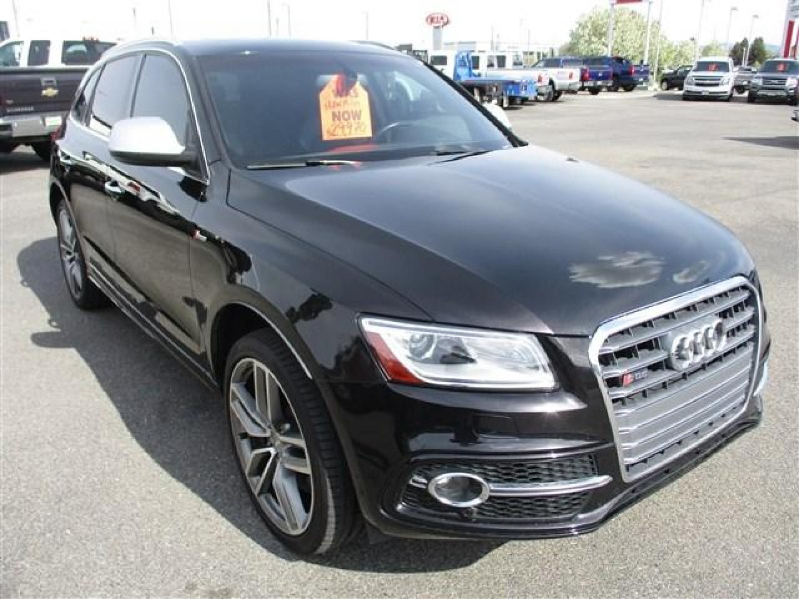 2015 BLACK /BLACK AUDI SQ5 PRESTIGE (WA1VGAFP9FA) with an 6 engine, Automatic transmission, located at 1580 E Lincoln Rd, Idaho Falls, ID, 83401, (208) 523-4000, 0.000000, 0.000000 - 4.7 SECOND 0-60 TIME. 354 HORSEPOWER. 8 SPEED AUTOMATIC TRANSMISSION. FACTORY 20 INCH AUDI SPORT RIMS WRAPPED IN PIRELLI TIRES. BODY AND PAINT ARE IN AMAZING CONDITION. THE PAINT IS A TRI-COAT BLACK WITH FLAKES OF BLUE, PURPLE, AND GREEN (MUST SEE IN PERSON). INSIDE THE CAR YOU'LL FIND SUADE CENTERS - Photo #8