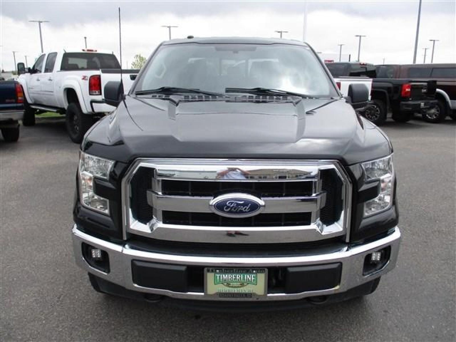 2017 BLACK /GREY FORD F150 XLT (1FTEW1EGXHF) with an 6 engine, Automatic transmission, located at 1580 E Lincoln Rd, Idaho Falls, ID, 83401, (208) 523-4000, 0.000000, 0.000000 - MotorTrend states this pickup has the ablility to achieve 18-25 MPG!! Body and paint are in amazing condition! Interior has no tears and nothing missing. Has the factory Ford running boards. Comes with a soft top tonneua cover, spray-in bedline, full sized rubber floor mats to protect the carpet und - Photo #8