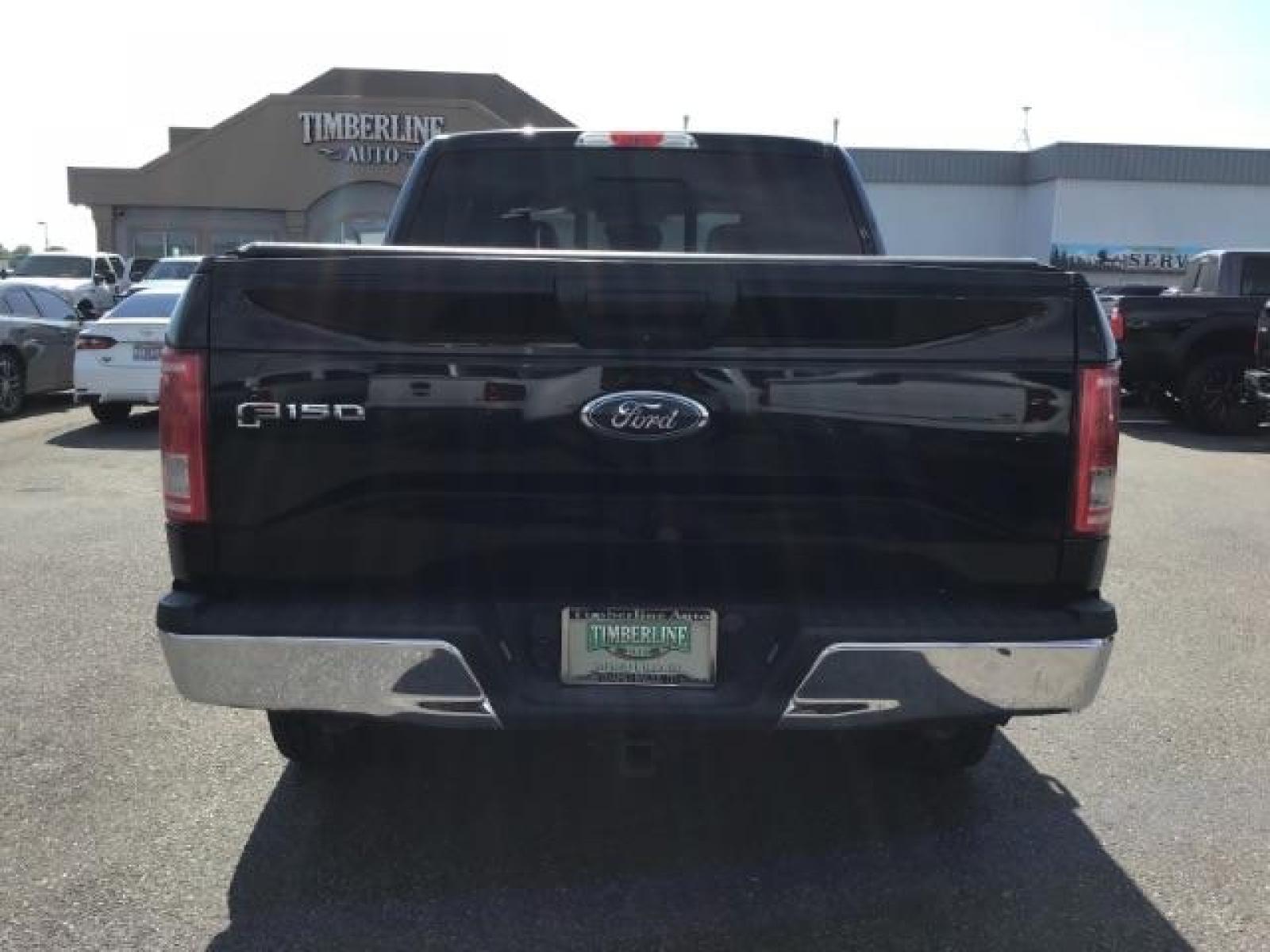 2017 Shadow Black /Medium Earth Gray, cloth Ford F-150 XLT SuperCrew 5.5-ft. Bed 4WD (1FTEW1EGXHF) with an 3.5L V6 TURBO engine, 6-Speed Automatic transmission, located at 1235 N Woodruff Ave., Idaho Falls, 83401, (208) 523-1053, 43.507172, -112.000488 - MotorTrend states this pickup has the abilities to achieve 18-25 MPG!! Body and paint are in amazing condition! Interior has no tears and nothing missing. Has the factory Ford running boards. Comes with a soft top tonneua cover, spray-in bedliner, and full sized rubber floor mats to protect the carp - Photo #4