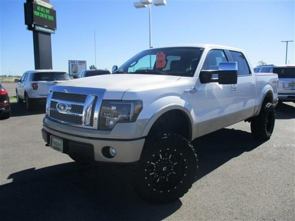 2010 WHITE /BROWN FORD F150 KING RANCH (1FTFW1EV6AK) with an 8 engine, Automatic transmission, located at 1580 E Lincoln Rd, Idaho Falls, ID, 83401, (208) 523-4000, 0.000000, 0.000000 - 5.4L TRITON- 4WD- CREW CAB- SHORT BED- LIFTED- AFTERMARKET 20'' WHEELS- LIKE NEW OVERSIZED TIRES- DRIVEN 111,207 MILES- LEATHER INTERIOR. At Timberline Auto it is always easy to find a great deal for a great vehicle. We pride ourselves on our ability to go the extra mile. With our exprerienced - Photo #1