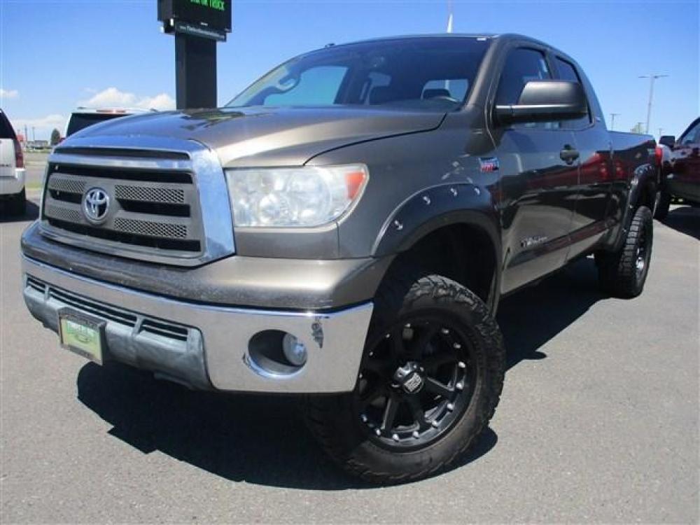 2012 BROWN /BLACK TOYOTA TUNDRA TRD OFF-ROAD (5TFUY5F12CX) with an 8 engine, Automatic transmission, located at 1580 E Lincoln Rd, Idaho Falls, ID, 83401, (208) 523-4000, 0.000000, 0.000000 - 5.7L iForce- 4WD- EXTENDED CAB- STANDARD BED- DRIVEN 201,016 MILES- LEATHER INTERIOR. At Timberline Auto it is always easy to find a great deal for a great vehicle. We pride ourselves on our ability to go the extra mile. With our exprerienced sales team we will be able to find you the right ri - Photo #1