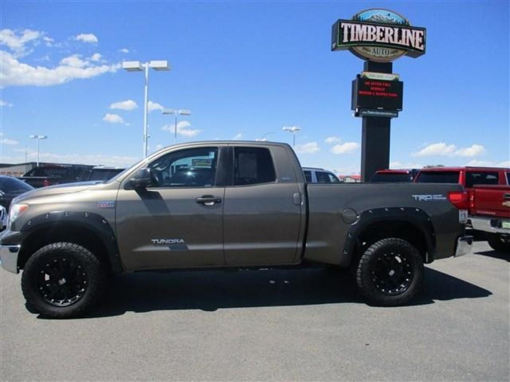 2012 BROWN /BLACK TOYOTA TUNDRA TRD OFF-ROAD (5TFUY5F12CX) with an 8 engine, Automatic transmission, located at 1580 E Lincoln Rd, Idaho Falls, ID, 83401, (208) 523-4000, 0.000000, 0.000000 - 5.7L iForce- 4WD- EXTENDED CAB- STANDARD BED- DRIVEN 201,016 MILES- LEATHER INTERIOR. At Timberline Auto it is always easy to find a great deal for a great vehicle. We pride ourselves on our ability to go the extra mile. With our exprerienced sales team we will be able to find you the right ri - Photo #2