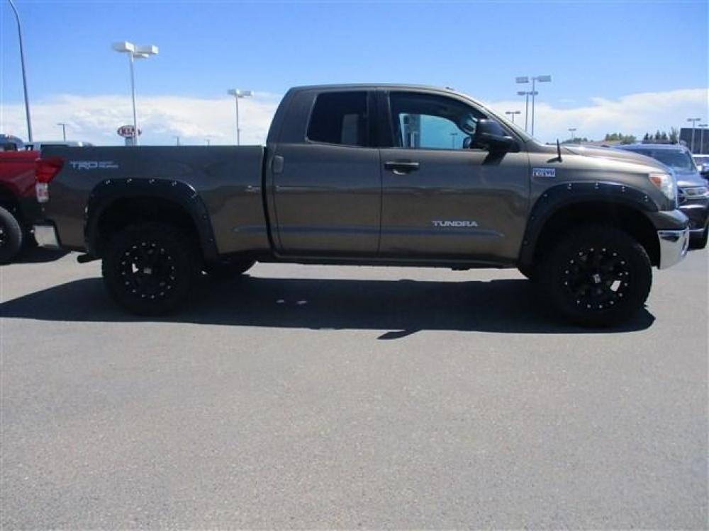2012 BROWN /BLACK TOYOTA TUNDRA TRD OFF-ROAD (5TFUY5F12CX) with an 8 engine, Automatic transmission, located at 1580 E Lincoln Rd, Idaho Falls, ID, 83401, (208) 523-4000, 0.000000, 0.000000 - 5.7L iForce- 4WD- EXTENDED CAB- STANDARD BED- DRIVEN 201,016 MILES- LEATHER INTERIOR. At Timberline Auto it is always easy to find a great deal for a great vehicle. We pride ourselves on our ability to go the extra mile. With our exprerienced sales team we will be able to find you the right ri - Photo #6