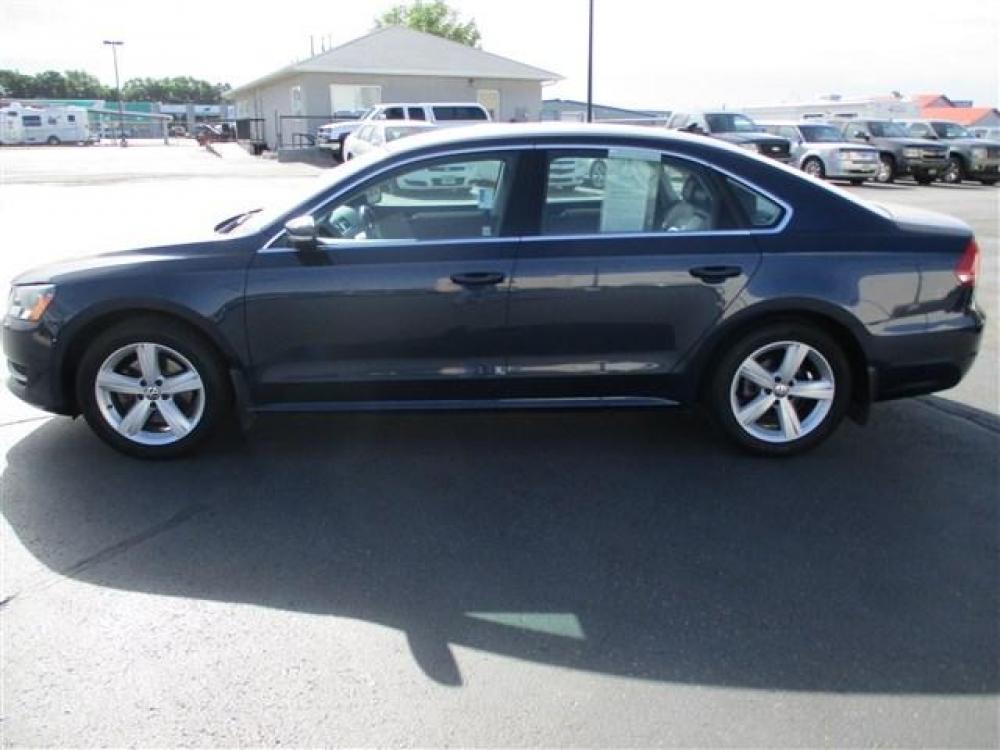 2014 BLUE VOLKSWAGEN PASSAT SE (1VWBT7A35EC) with an 4 engine, 5 Speed Manual transmission, located at 1580 E Lincoln Rd, Idaho Falls, ID, 83401, (208) 523-4000, 0.000000, 0.000000 - Photo #1