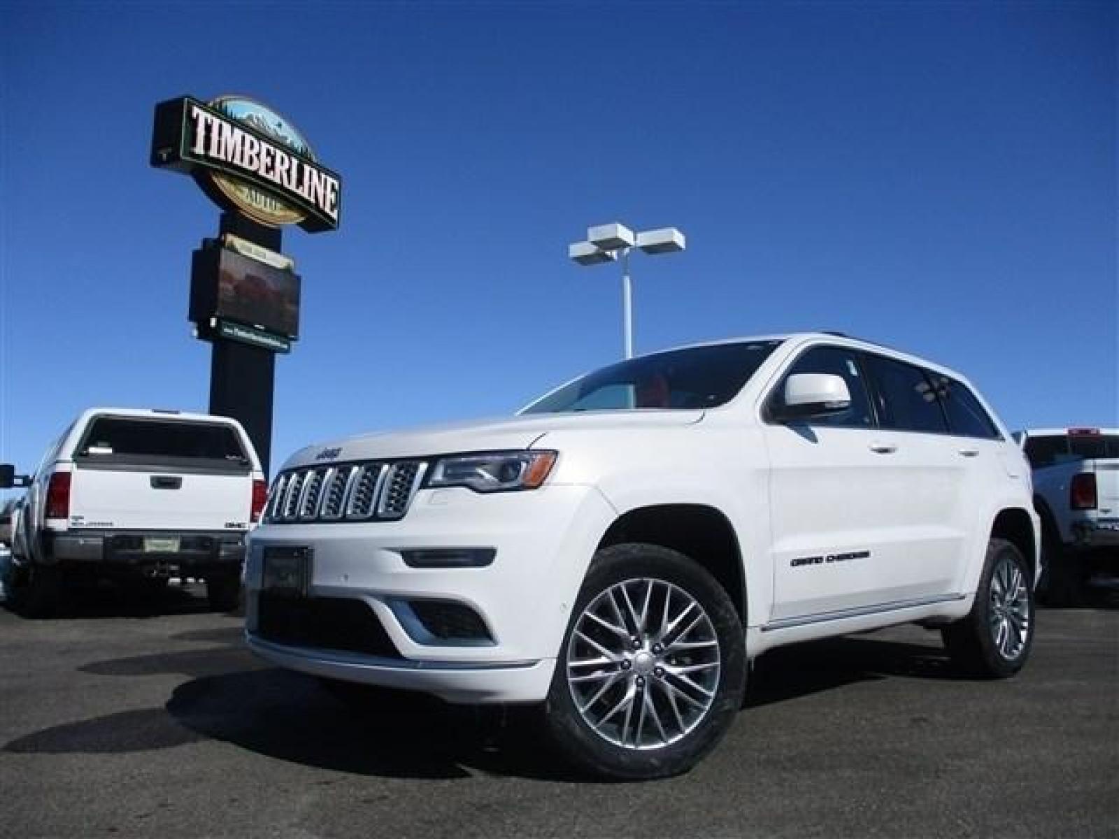 2018 WHITE /BLACK JEEP GRAND CHEROKEE SUMMIT (1C4RJFJTXJC) with an 8 engine, Automatic transmission, located at 1580 E Lincoln Rd, Idaho Falls, ID, 83401, (208) 523-4000, 0.000000, 0.000000 - ADJUSTABLE RIDE HEIGHTH. FACTORY PREMIUM 20 INCH WHEELS. SLEEK COLOR MATCHED BUMPERS. SUMMIT PREMIUM LEATHER INTERIOR IN PERFECT CONDITION. HEATED AND COOLED SEATS. HEATED STEERING WHEEL. HEATED REAR SEATS. PARK ASSIST. LANE ASSIST. ECONOMY MODE. SPORT MODE. BLIND SPOT MINITOR. ADAPTIVE CRUISE CONTR - Photo #0