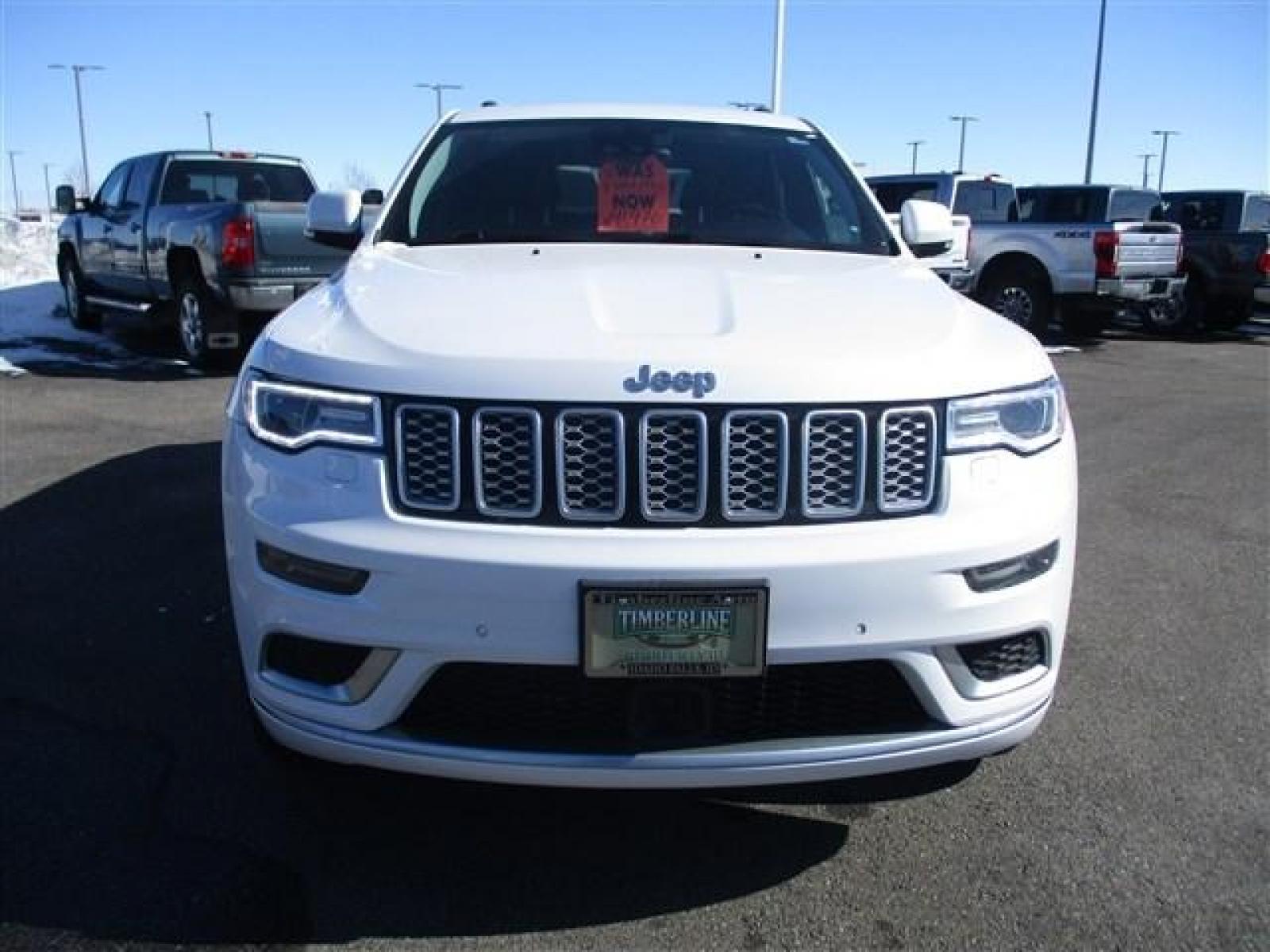 2018 WHITE /BLACK JEEP GRAND CHEROKEE SUMMIT (1C4RJFJTXJC) with an 8 engine, Automatic transmission, located at 1580 E Lincoln Rd, Idaho Falls, ID, 83401, (208) 523-4000, 0.000000, 0.000000 - ADJUSTABLE RIDE HEIGHTH. FACTORY PREMIUM 20 INCH WHEELS. SLEEK COLOR MATCHED BUMPERS. SUMMIT PREMIUM LEATHER INTERIOR IN PERFECT CONDITION. HEATED AND COOLED SEATS. HEATED STEERING WHEEL. HEATED REAR SEATS. PARK ASSIST. LANE ASSIST. ECONOMY MODE. SPORT MODE. BLIND SPOT MINITOR. ADAPTIVE CRUISE CONTR - Photo #8