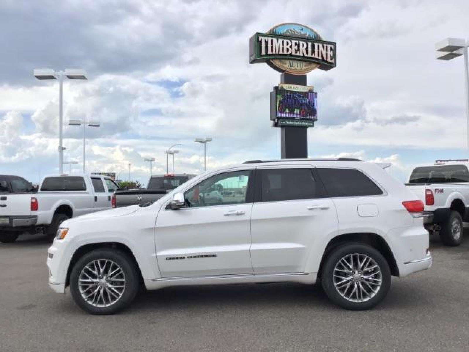 2018 Bright White Clear Coat /Black, leather Jeep Grand Cherokee Summit 4WD (1C4RJFJTXJC) with an 5.7L V8 OHV 16V engine, 8-Speed Automatic transmission, located at 1235 N Woodruff Ave., Idaho Falls, 83401, (208) 523-1053, 43.507172, -112.000488 - Equipped with the 5.7 V8 Hemi, adjustable ride height, factory 20 inch premium wheels, paint matched bumpers, SUMMIT premium leather interior, comfort and safety options, terrain select, and a double sunroof! At timberline Auto it is always easy to find a great deal on your next vehicle! Our exper - Photo #2
