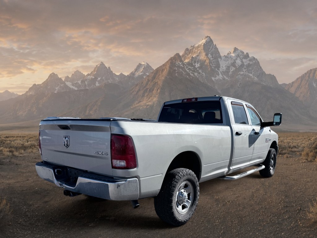 2010 Bright Silver Metallic Clearcoat /Dark Slate/Medium Graystone Dodge Ram Pickup ST (3D7TT2CTXAG) with an V8, 5.7L engine, 5-speed multi-speed automatic transmission, located at 1175 N Woodruff Ave, Idaho Falls, ID, 83401, 43.506901, -111.999657 - <b>Vehicle Details</b><br>Built for hard work and dependable performance, this pre-owned 2010 Dodge Ram Pickup 2500 ST is a strong choice for drivers who need serious capability in a rugged full-size truck. Equipped with 4WD and a V8 5.7L Gasoline engine, this Ram 2500 delivers the power and tractio- Photo#4