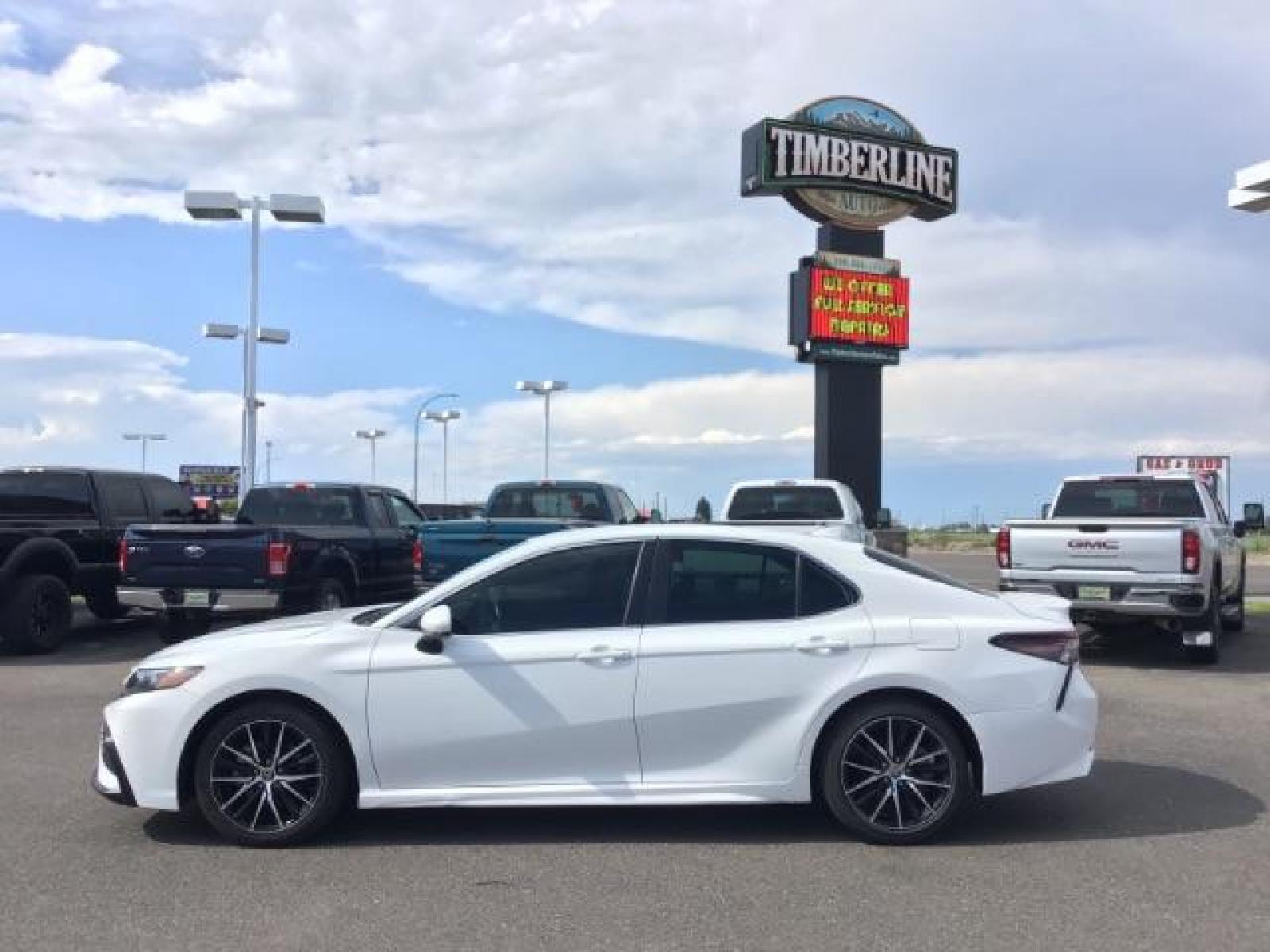 2021 Super White /Ash, leatherette/cloth Toyota Camry SE (4T1G11AKXMU) with an 2.5L L4 DOHC 16V engine, 8-Speed Automatic transmission, located at 1235 N Woodruff Ave., Idaho Falls, 83401, (208) 523-1053, 43.507172, -112.000488 - Photo #2