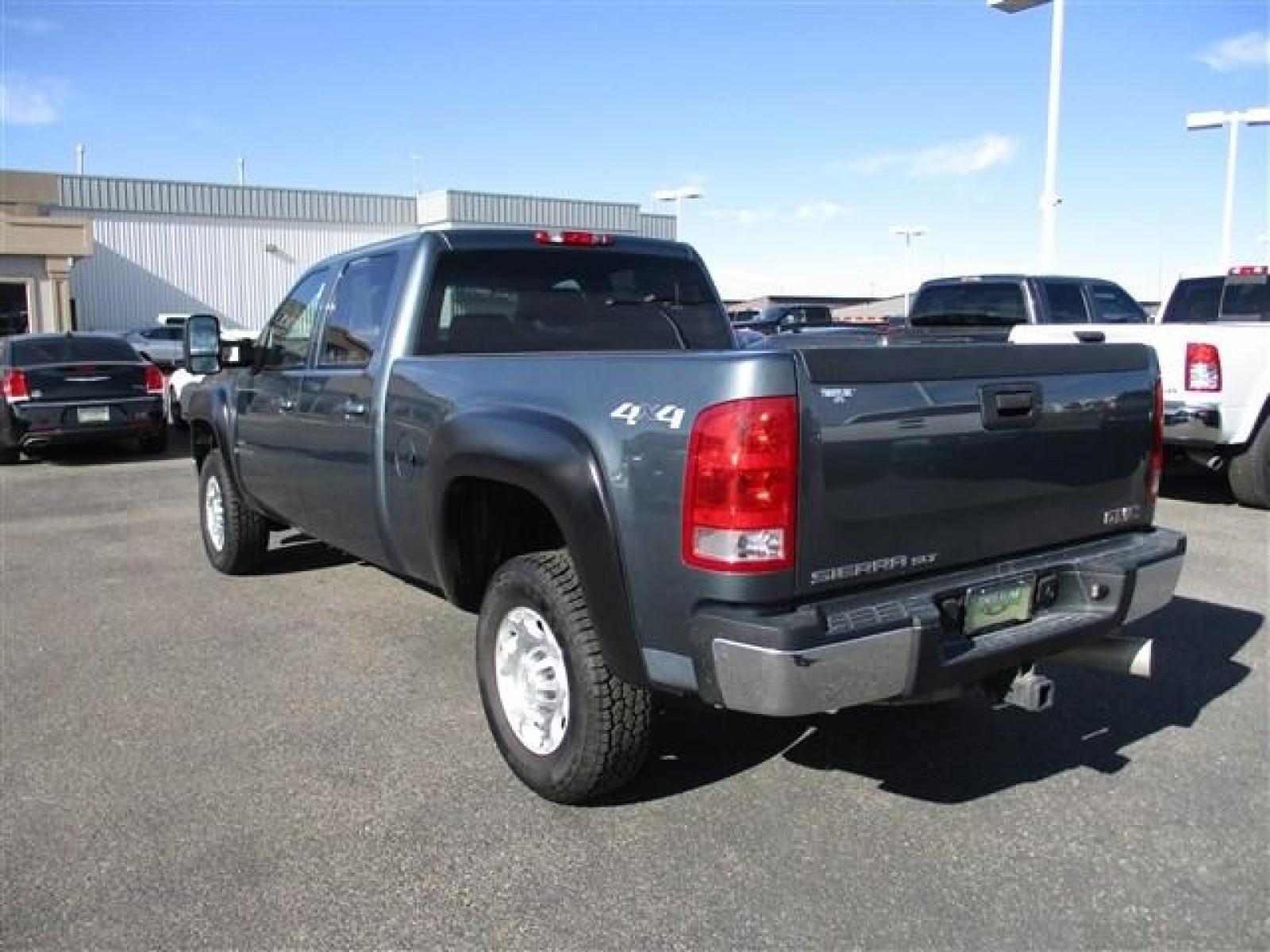2009 BLUE GMC K2500 HEAVY DUTY SLT (1GTHK43649F) with an 8 engine, Automatic transmission, located at 1580 E Lincoln Rd, Idaho Falls, ID, 83401, (208) 523-4000, 0.000000, 0.000000 - HARD TO FIND LOW MILE DIESEL UNDER $40,000!! VERY CLEAN INSIDE AND OUT. NEW ROVELO RIDGETRAK A/T TIRES. NO LEAKS. EVERYTHING WORKS. NOTHING MISSING. SUNROOF. DUAL POWER SEATS. STEERING WHEEL MOUNTED CONTROLS. DUAL CLIMATE CONTROL. HEATED SEATS. ELECTRIC 4X4 SELECT. TRAILER BRAKE. THIS ONE IS DEFFINI - Photo #3