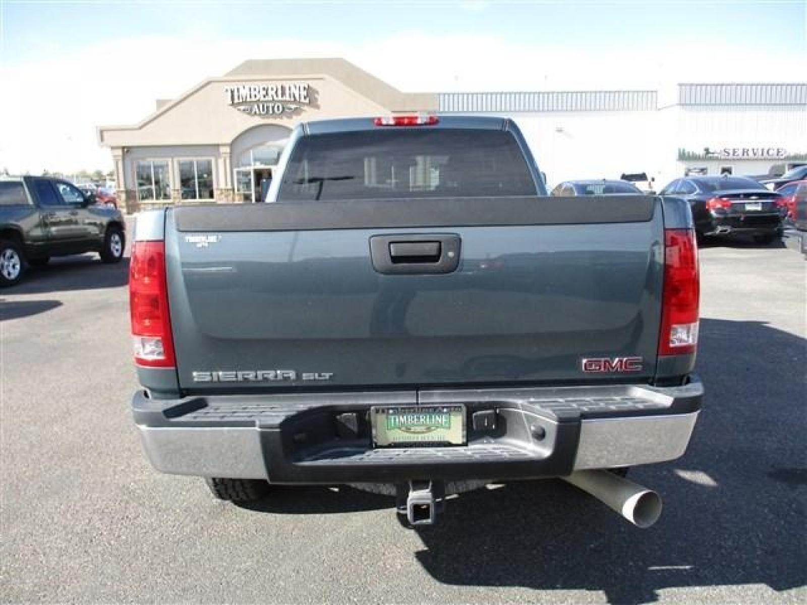 2009 BLUE GMC K2500 HEAVY DUTY SLT (1GTHK43649F) with an 8 engine, Automatic transmission, located at 1580 E Lincoln Rd, Idaho Falls, ID, 83401, (208) 523-4000, 0.000000, 0.000000 - HARD TO FIND LOW MILE DIESEL UNDER $40,000!! VERY CLEAN INSIDE AND OUT. NEW ROVELO RIDGETRAK A/T TIRES. NO LEAKS. EVERYTHING WORKS. NOTHING MISSING. SUNROOF. DUAL POWER SEATS. STEERING WHEEL MOUNTED CONTROLS. DUAL CLIMATE CONTROL. HEATED SEATS. ELECTRIC 4X4 SELECT. TRAILER BRAKE. THIS ONE IS DEFFINI - Photo #4