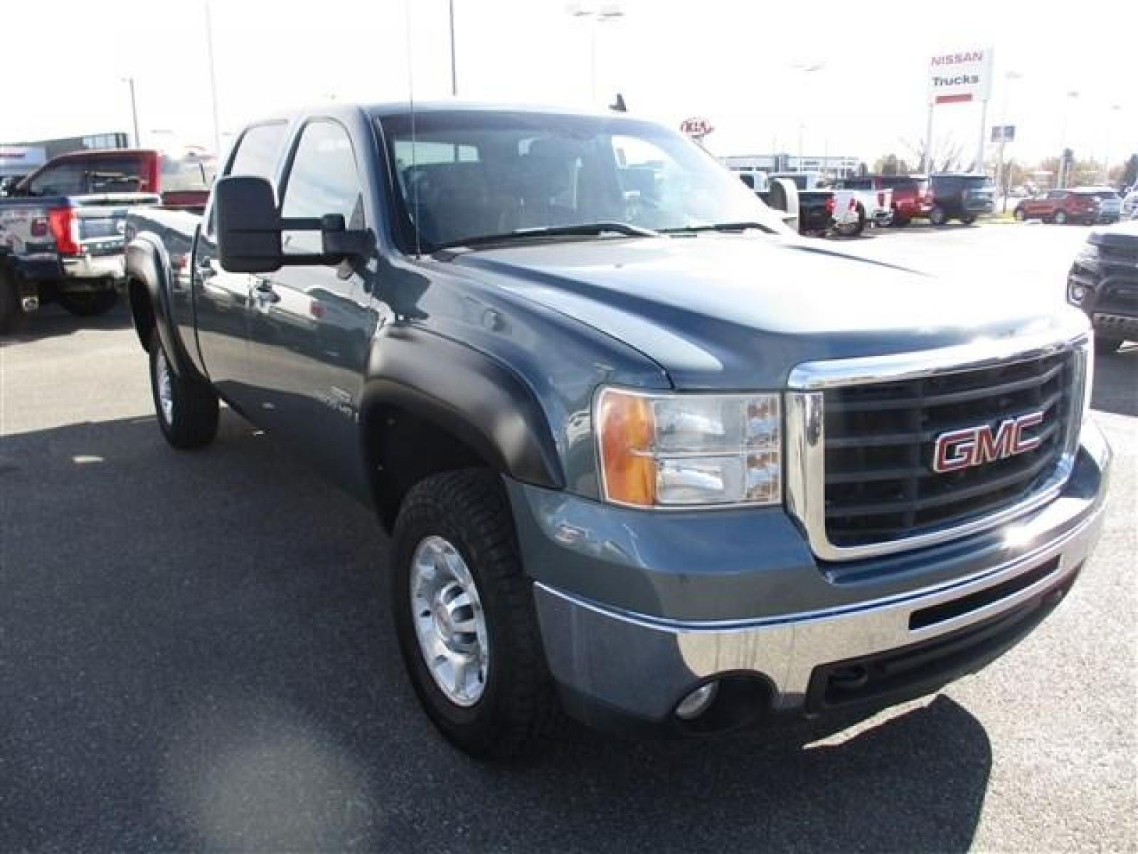 2009 BLUE GMC K2500 HEAVY DUTY SLT (1GTHK43649F) with an 8 engine, Automatic transmission, located at 1580 E Lincoln Rd, Idaho Falls, ID, 83401, (208) 523-4000, 0.000000, 0.000000 - HARD TO FIND LOW MILE DIESEL UNDER $40,000!! VERY CLEAN INSIDE AND OUT. NEW ROVELO RIDGETRAK A/T TIRES. NO LEAKS. EVERYTHING WORKS. NOTHING MISSING. SUNROOF. DUAL POWER SEATS. STEERING WHEEL MOUNTED CONTROLS. DUAL CLIMATE CONTROL. HEATED SEATS. ELECTRIC 4X4 SELECT. TRAILER BRAKE. THIS ONE IS DEFFINI - Photo #7