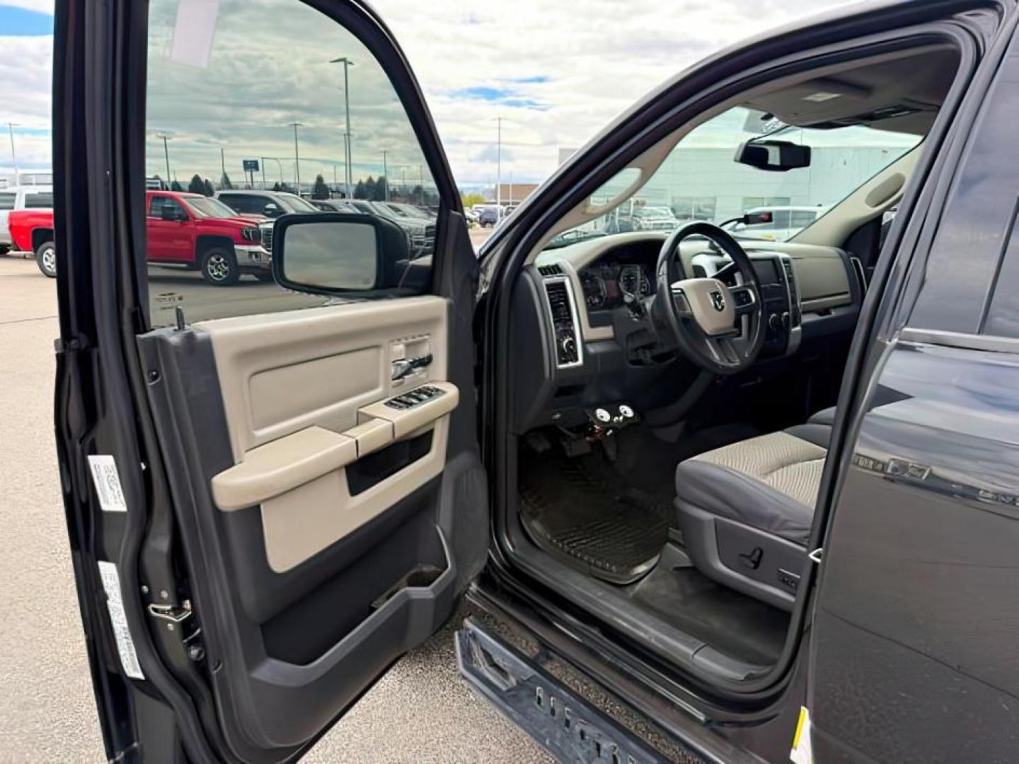 2011 BLACK /CLOTH Ram 1500 (1D7RV1CT3BS) with an 57 V8 engine, Automatic transmission, located at 1175 N Woodruff Ave, Idaho Falls, ID, 83401, 43.506901, -111.999657 - At Timberline Auto, finding a great deal on your next vehicle is always easy! Our experienced sales staff goal is to help find you the right vehicle at the right price! Our knowledgeable finance department has options for almost any credit score. We offer extended service contract options to prot - Photo#8
