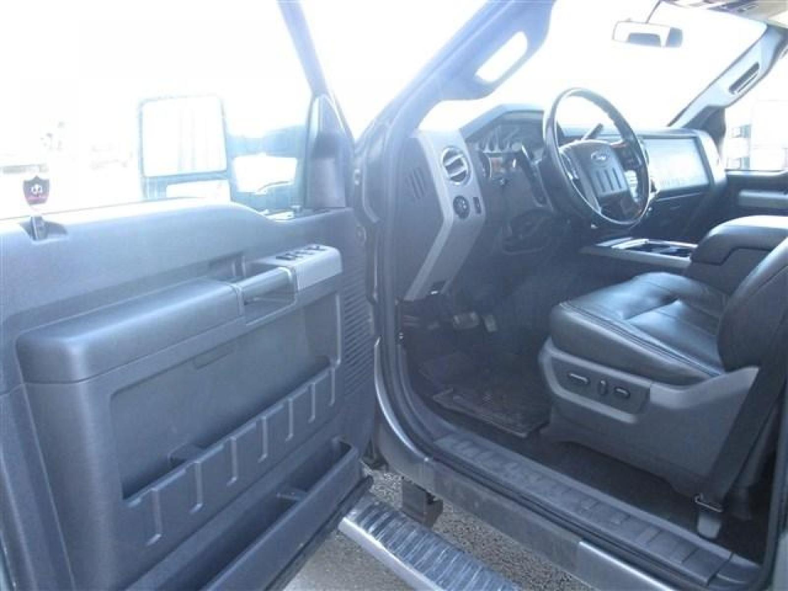 2012 GRAY /BLACK FORD F350 LARIAT (1FT8W3BT1CE) with an 8 engine, Automatic transmission, located at 1580 E Lincoln Rd, Idaho Falls, ID, 83401, (208) 523-4000, 0.000000, 0.000000 - SUPER CLEAN BODY AND PAINT. INTERIOR HAS NO TEARS OR ANYTHING MISSING. MECHANICALLY STOCK. STOCK SUSPENSION. FACTORY RUNNING BOARDS. FIFTH WHEEL RAILS AND REESE HITCH INSTALLED/INCLUDED. TIRES AT 80% TREAD. DUAL POWER SEATS. HEATED AND COOLED SEATS. SUNROOF. TRAILER BRAKE. EXHAUST BRAKE. LOCKING REA - Photo #9