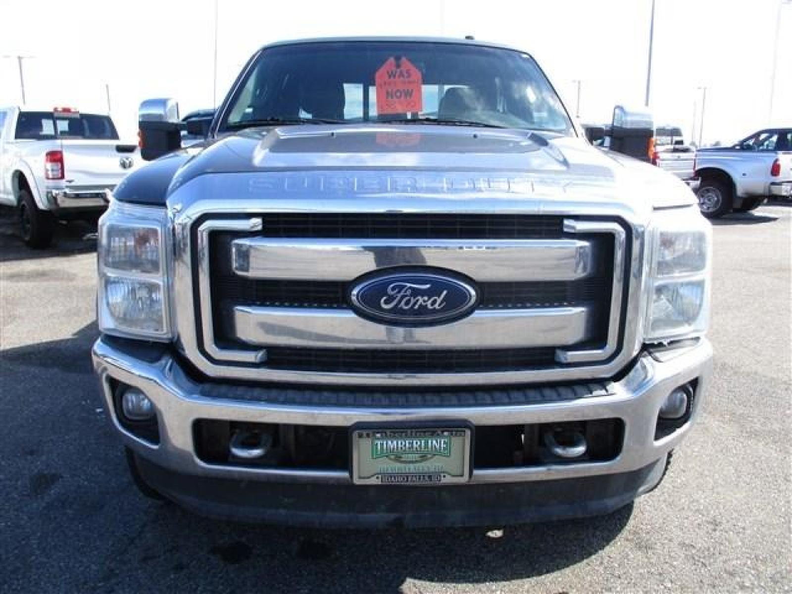 2012 GRAY /BLACK FORD F350 LARIAT (1FT8W3BT1CE) with an 8 engine, Automatic transmission, located at 1580 E Lincoln Rd, Idaho Falls, ID, 83401, (208) 523-4000, 0.000000, 0.000000 - SUPER CLEAN BODY AND PAINT. INTERIOR HAS NO TEARS OR ANYTHING MISSING. MECHANICALLY STOCK. STOCK SUSPENSION. FACTORY RUNNING BOARDS. FIFTH WHEEL RAILS AND REESE HITCH INSTALLED/INCLUDED. TIRES AT 80% TREAD. DUAL POWER SEATS. HEATED AND COOLED SEATS. SUNROOF. TRAILER BRAKE. EXHAUST BRAKE. LOCKING REA - Photo #8