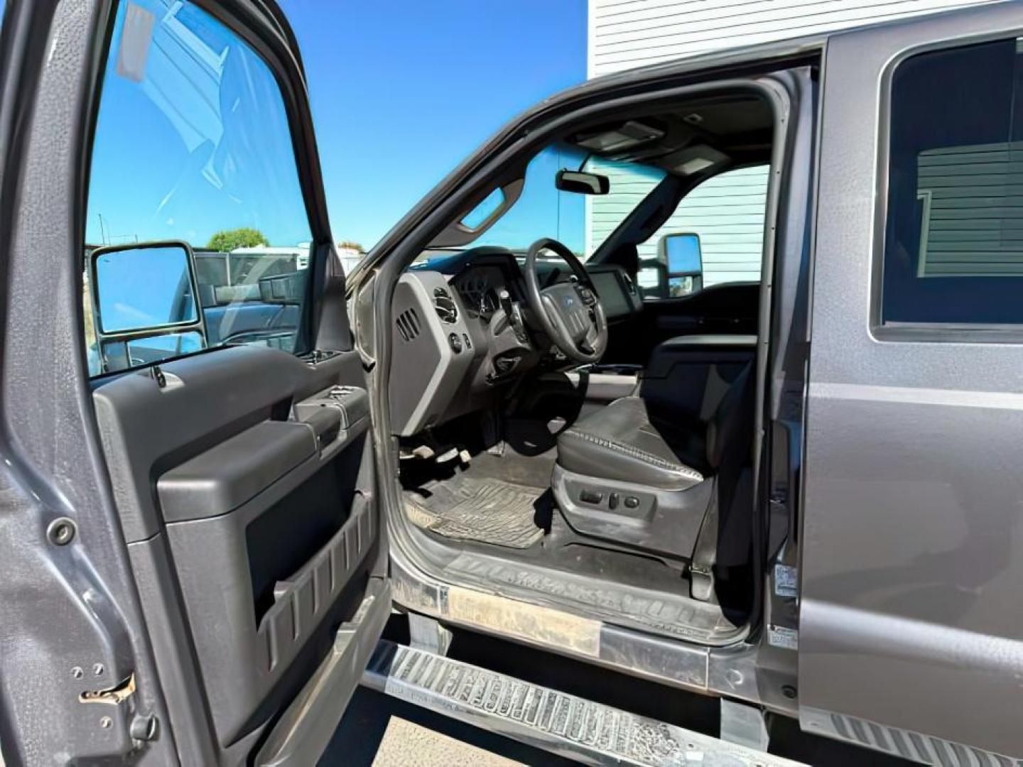 2012 GRAY /CLOTH Ford F-350 SD (1FT8W3BT1CE) with an 67L V8 OHV 16V DIESEL engine, Automatic transmission, located at 1175 N Woodruff Ave, Idaho Falls, ID, 83401, 43.506901, -111.999657 - At Timberline Auto, finding a great deal on your next vehicle is always easy! Our experienced sales staff's goal is to help find you the right vehicle at the right price! Our knowledgeable finance department has options for almost any credit score. We offer extended service contract options to prote - Photo#9