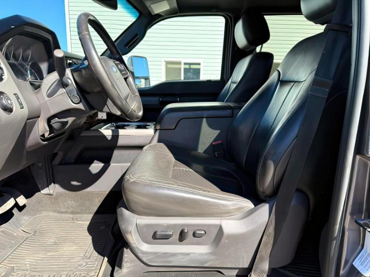 2012 GRAY /CLOTH Ford F-350 SD (1FT8W3BT1CE) with an 67L V8 OHV 16V DIESEL engine, Automatic transmission, located at 1175 N Woodruff Ave, Idaho Falls, ID, 83401, 43.506901, -111.999657 - At Timberline Auto, finding a great deal on your next vehicle is always easy! Our experienced sales staff's goal is to help find you the right vehicle at the right price! Our knowledgeable finance department has options for almost any credit score. We offer extended service contract options to prote - Photo#10